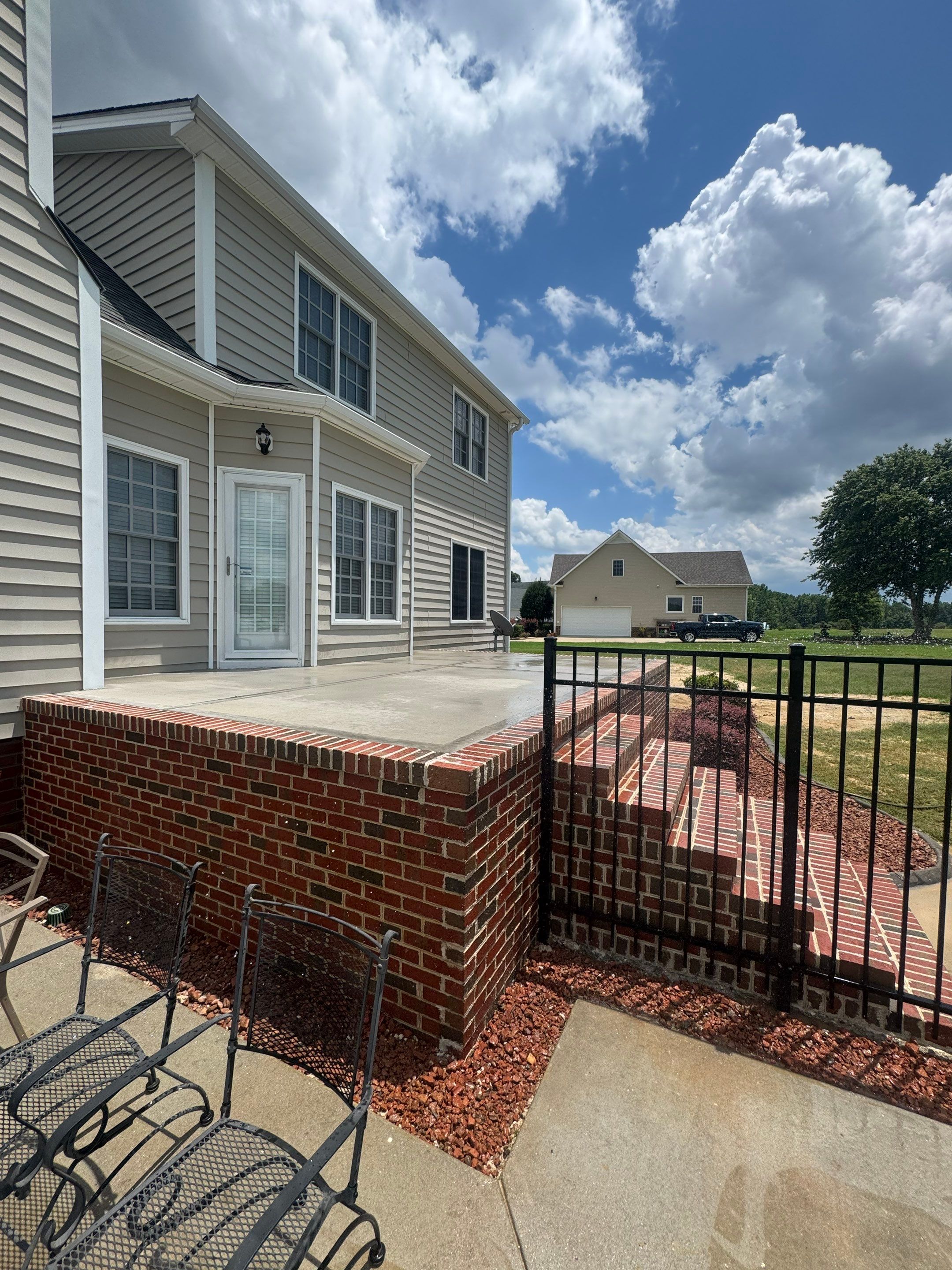 Custom Screened Porch and Concrete Walkway Installation in Rocky Mount by The Remodeling Company