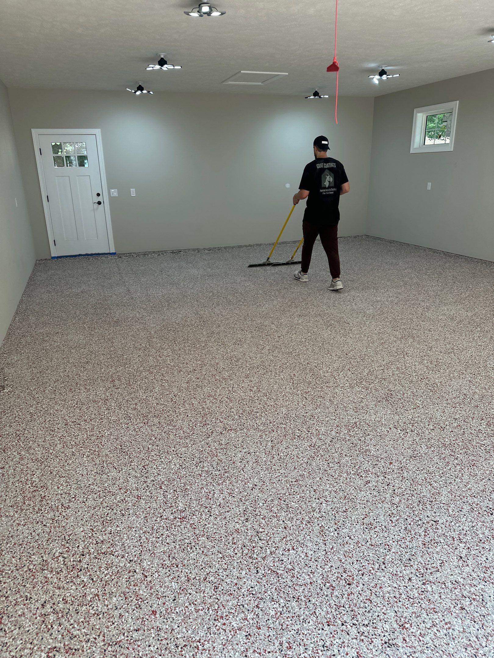 GO BIG RED: Custom Flake Epoxy Garage Floor in Lincoln by Goat Coatings