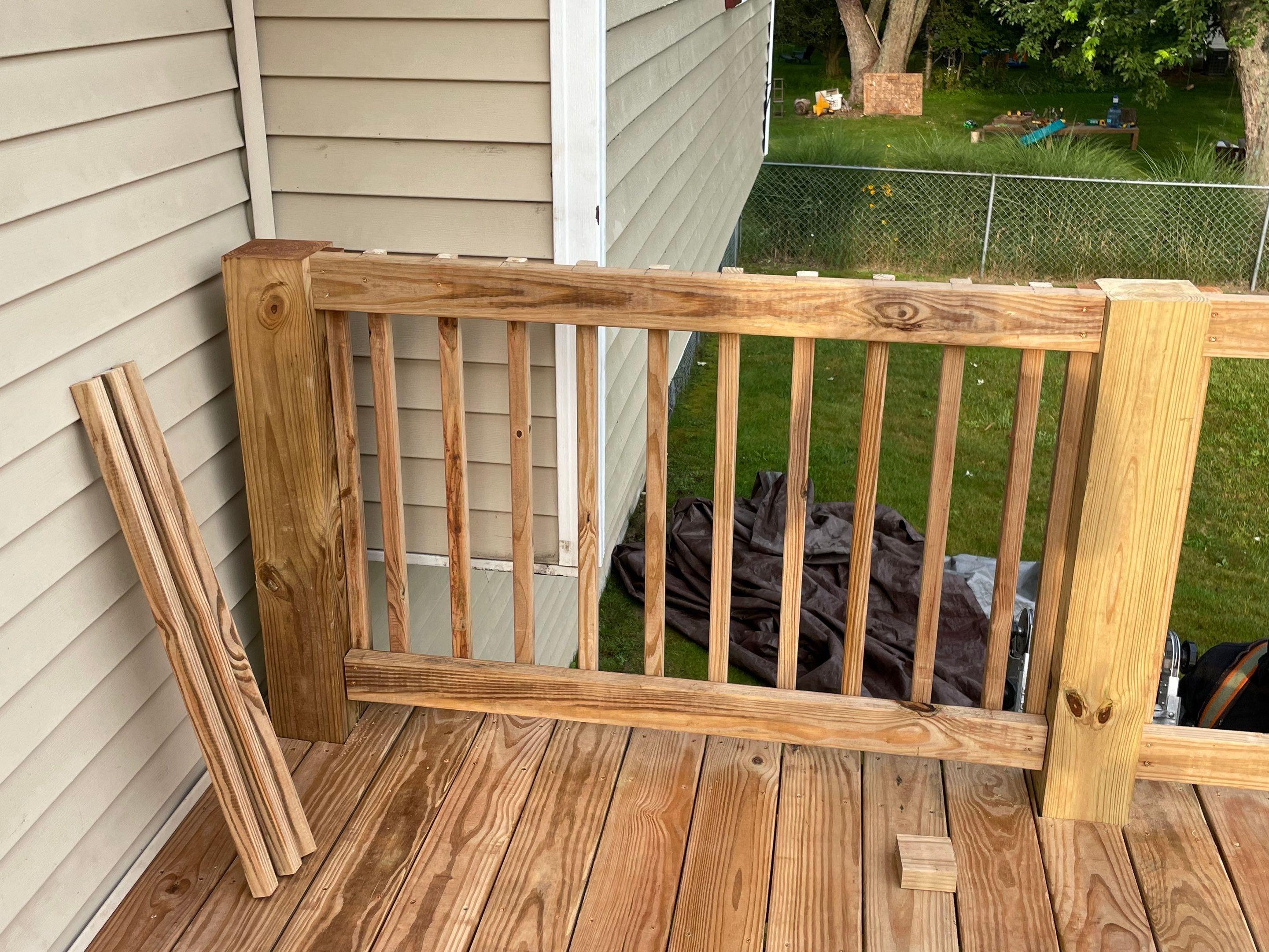 Deck Installation using Treated Lumber by Avalon Roofing and Exteriors