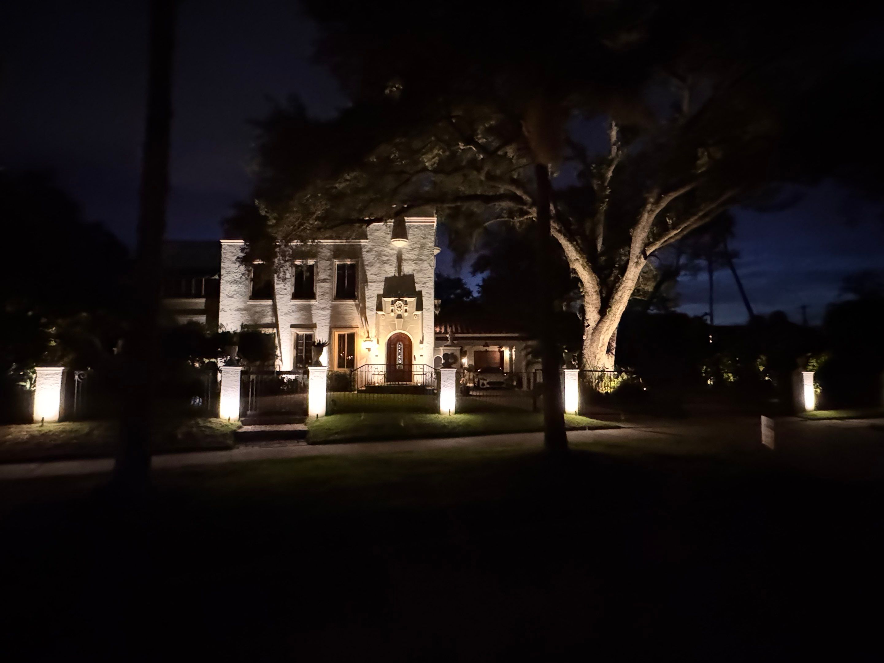 Architectural and Landscape Lighting for Tampa Stucco Estate by Elegant Accents