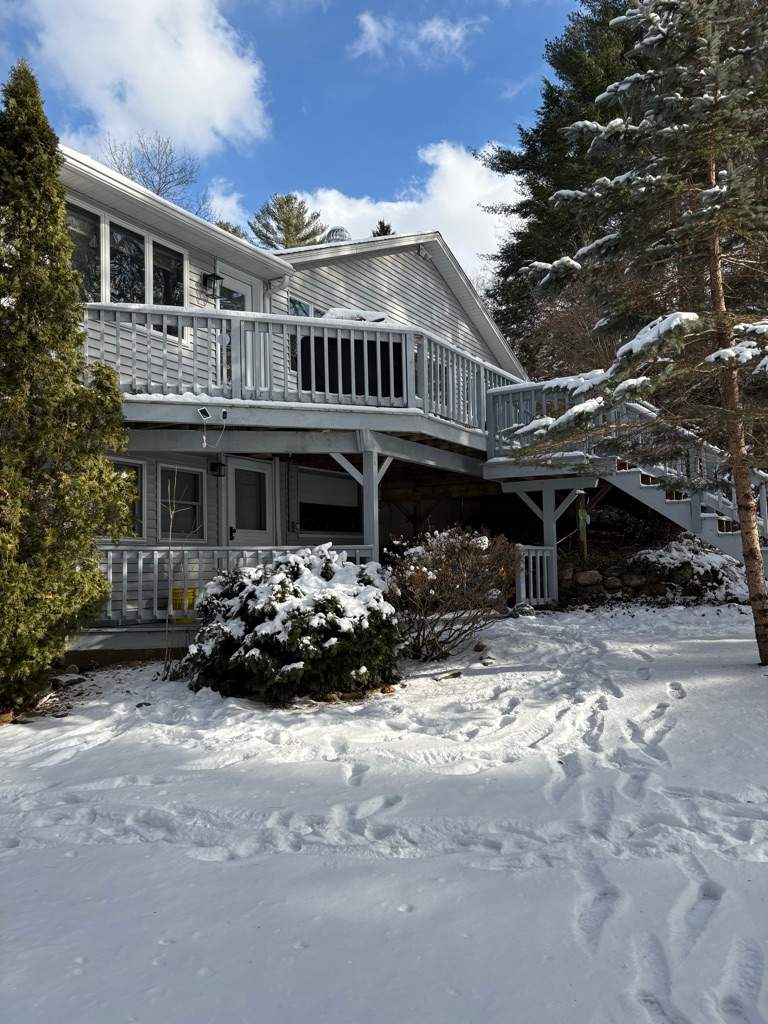 Deck replacement using Trex Transcend Rope Swing and Transcend Railings.Trex Rainescape by DiGiorgi Roofing and Siding Inc