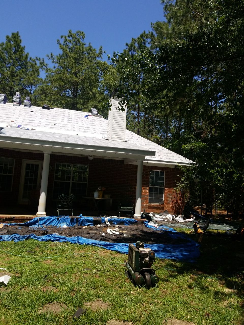 Residential Roofing Installation using Roof Replacement by American Roofing & Construction LLC