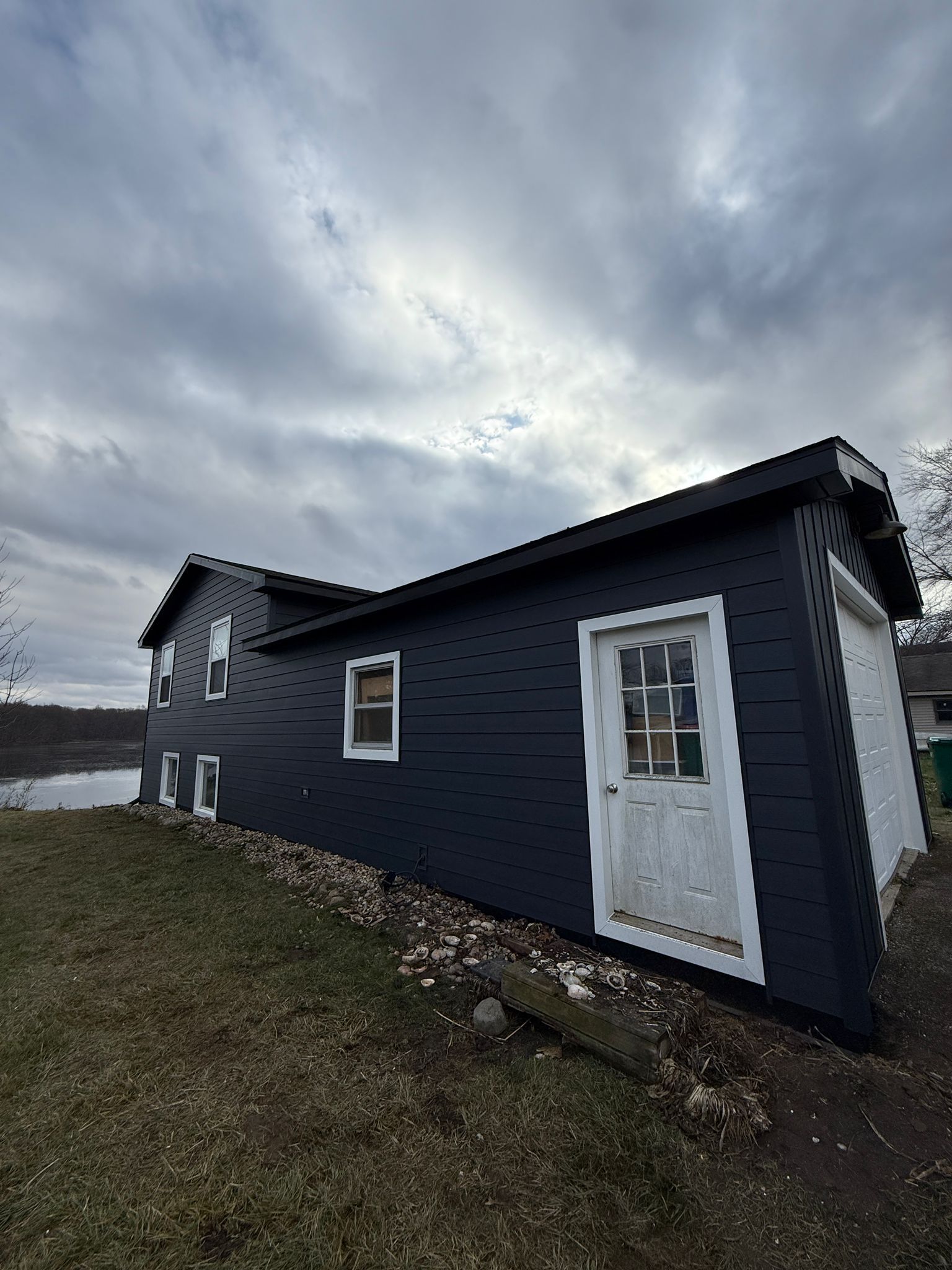 Siding Installation using Alside Composite Siding by Avalon Roofing and Exteriors