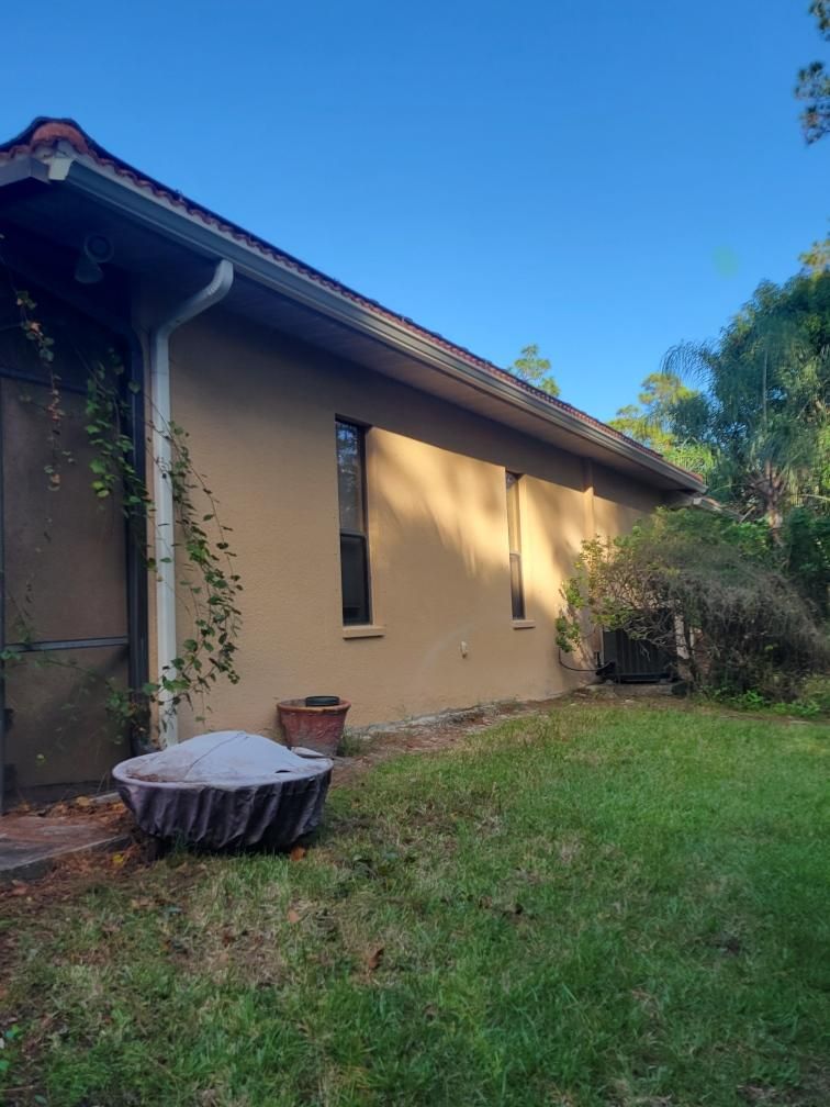 New Splash Guards and 6-Inch seamless Gutters in Naples FL by Gutter Professors