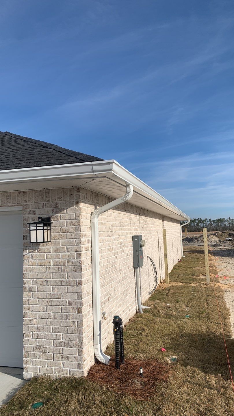Seamless Gutter Installation Using White K-Style Gutters by Gutter Professors