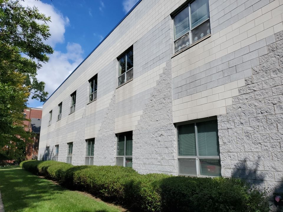 commercial pressure washing using Algaecide, soft wash soap by Northern Power Washing LLC.