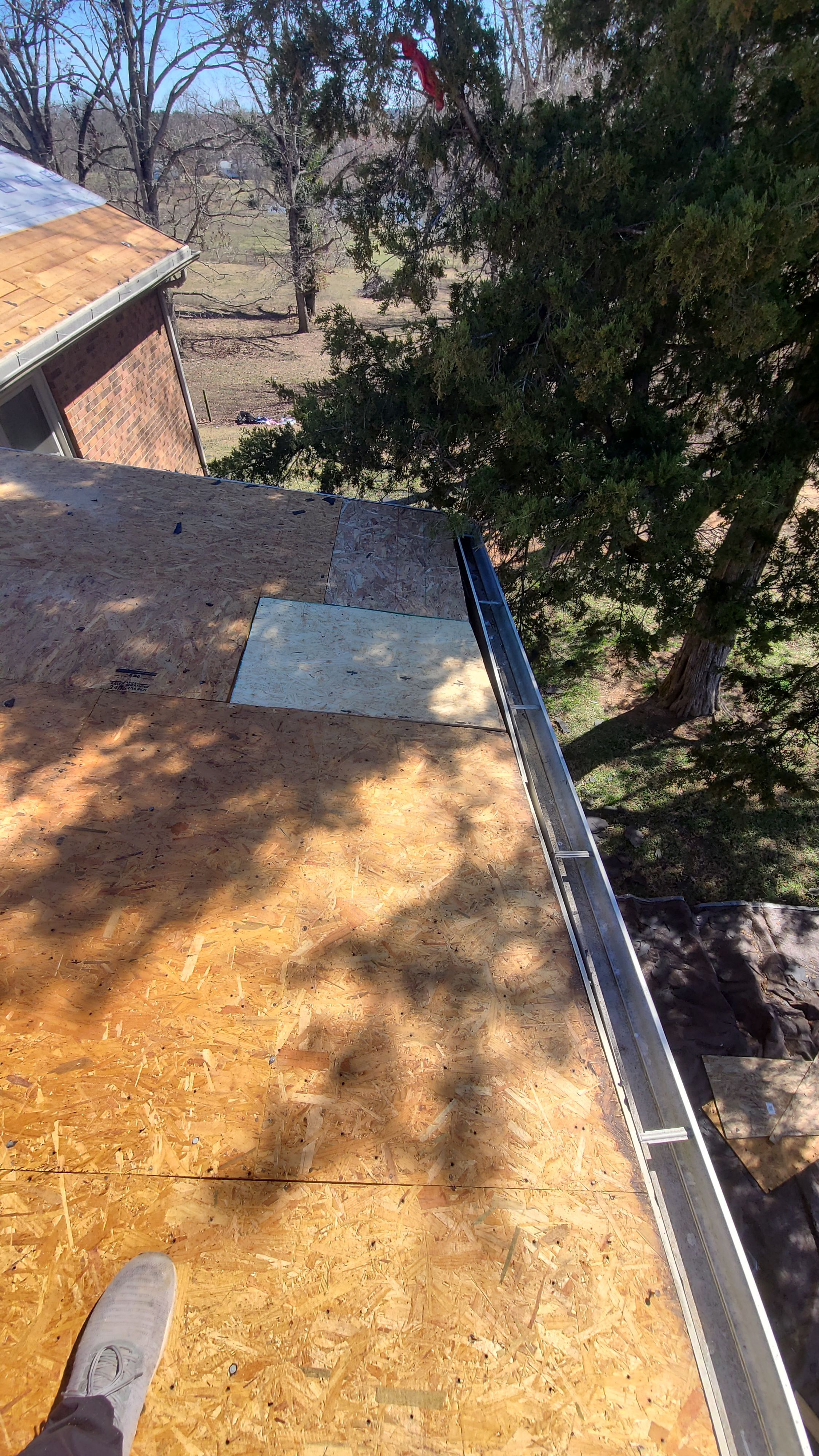 Farm roof job by BROCK BUILDERS 