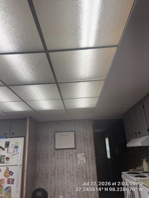 Kitchen Renovation with Gray Cabinets and Mosaic Backsplash in Attica