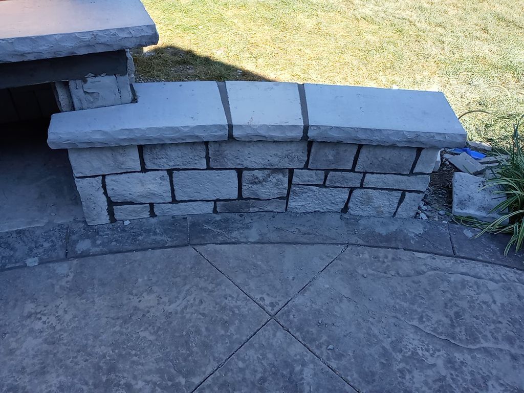 Back Yard Fireplace and Landscape by LAND ESCAPES LLC