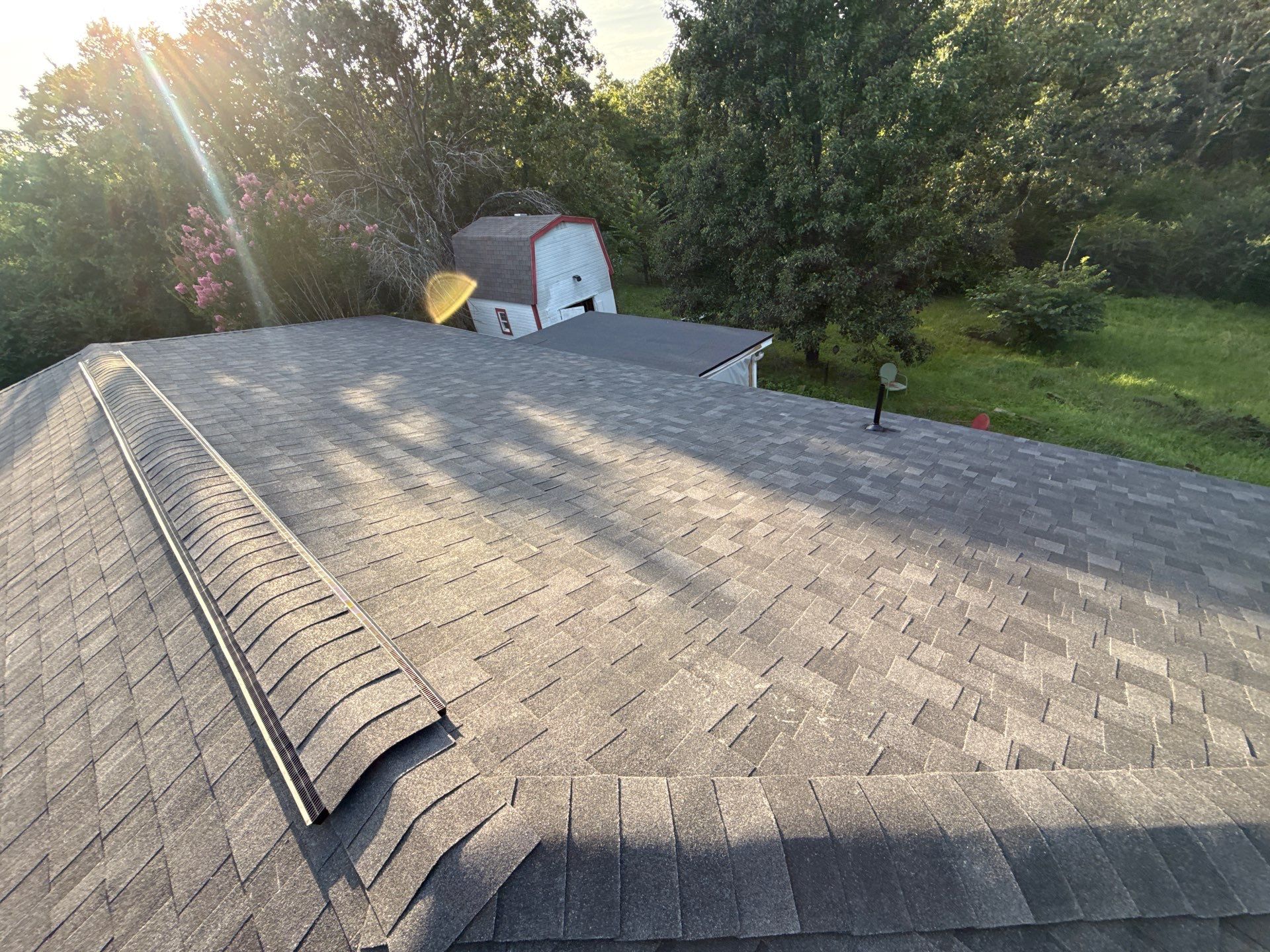 2 layers tear off & installation of new architectural shingles. by In & Out Construction & Remodeling, LLC
