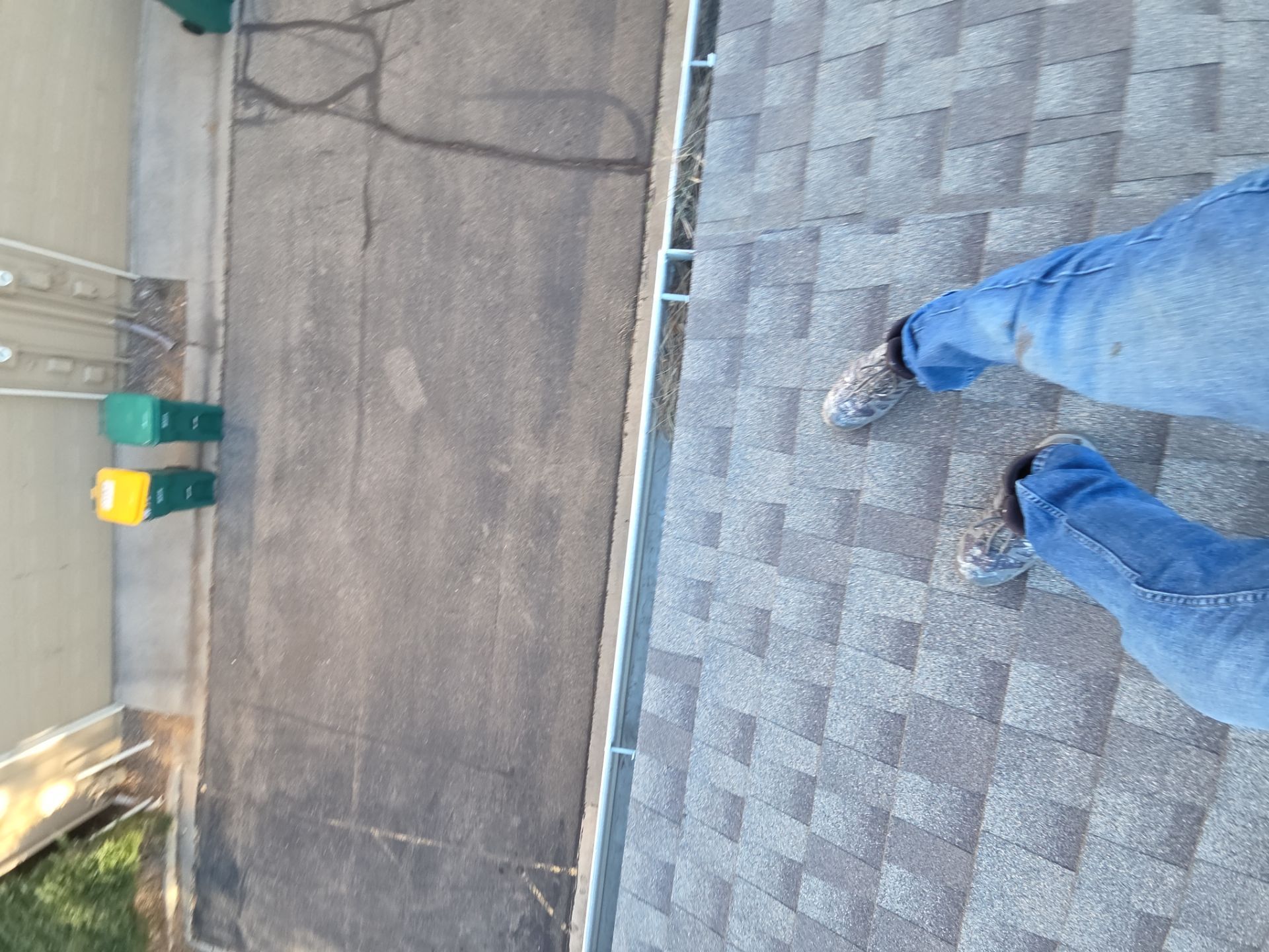 Gutter & Downspout Cleaning  by RTP Roofing Company