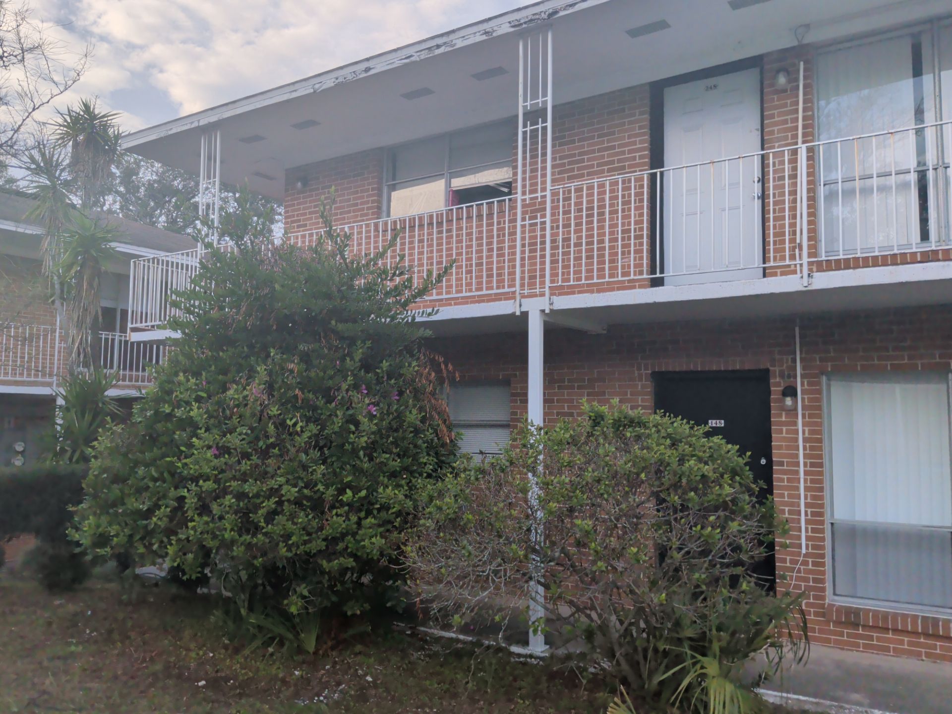 Apartment Landscape Cleanup & Ongoing Grounds Maintenance — Cimarron Apartments (Arlington) by Harmoni Home Services