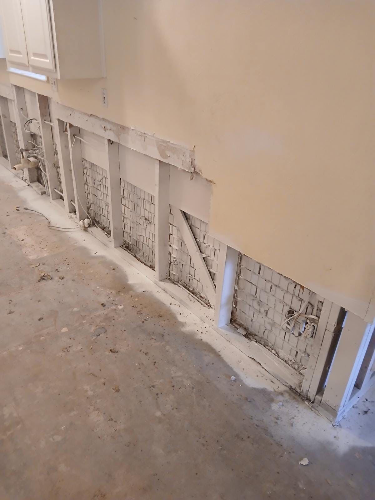 Home Remodel after Huge Water Damage by L&T General Contractors and Restoration INC