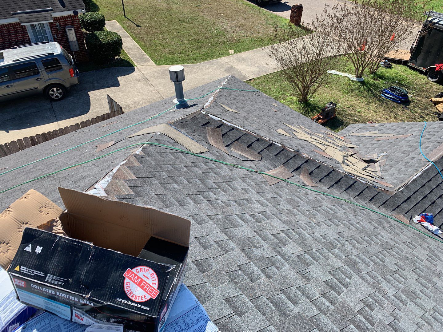Residential Roofing Installation using Roof Replacement by American Roofing & Construction LLC