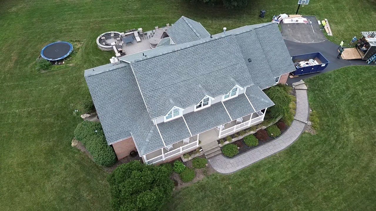 Full Roofing Replacement and Gray Shake Hardie Siding Installation in Butler by Cousins Roofing Siding & Decks