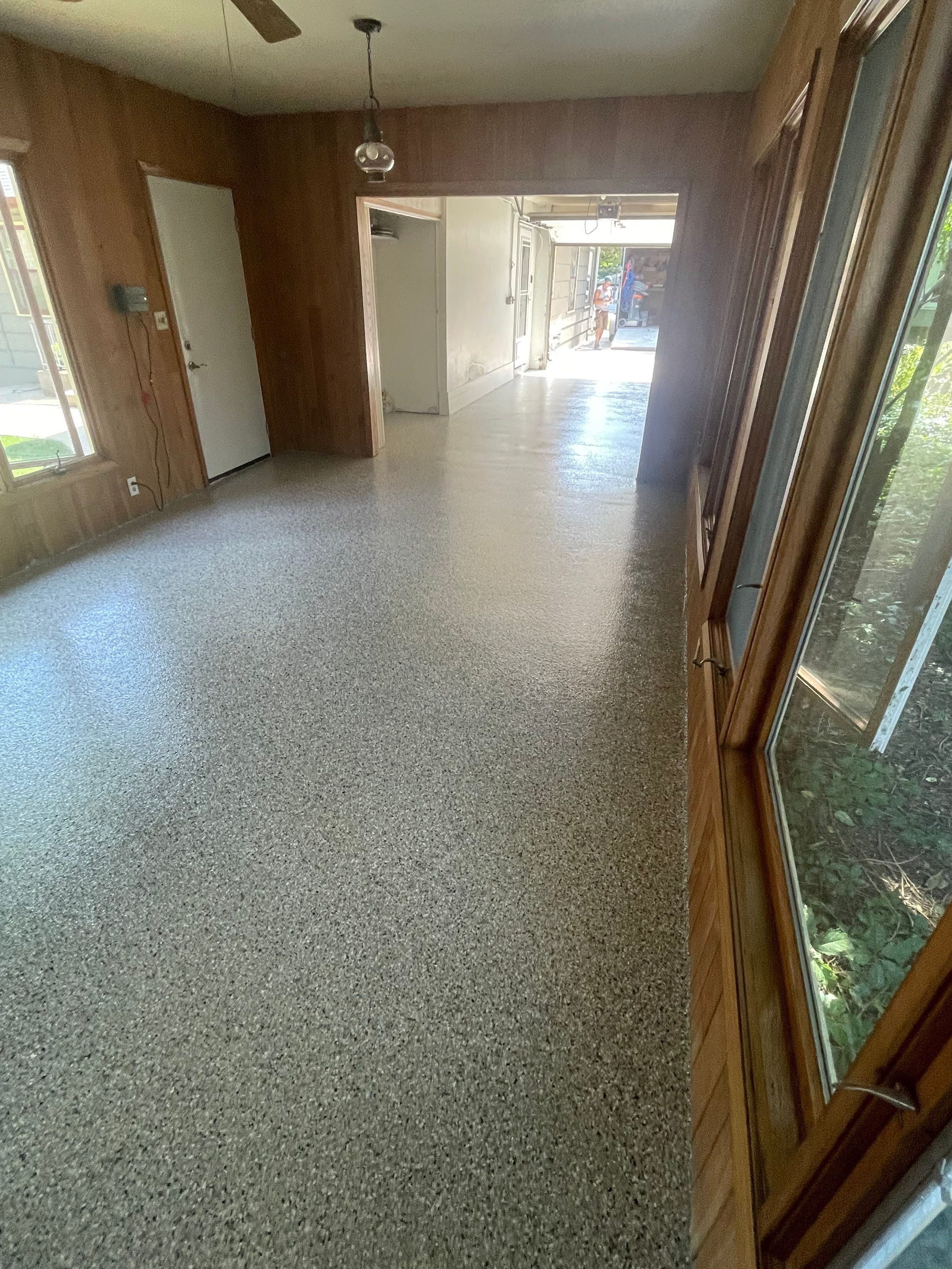 Sioux Falls Garage and Sunroom Concrete Coating with Coyote Flake by Select Painting, Coatings & Garage Cabinets