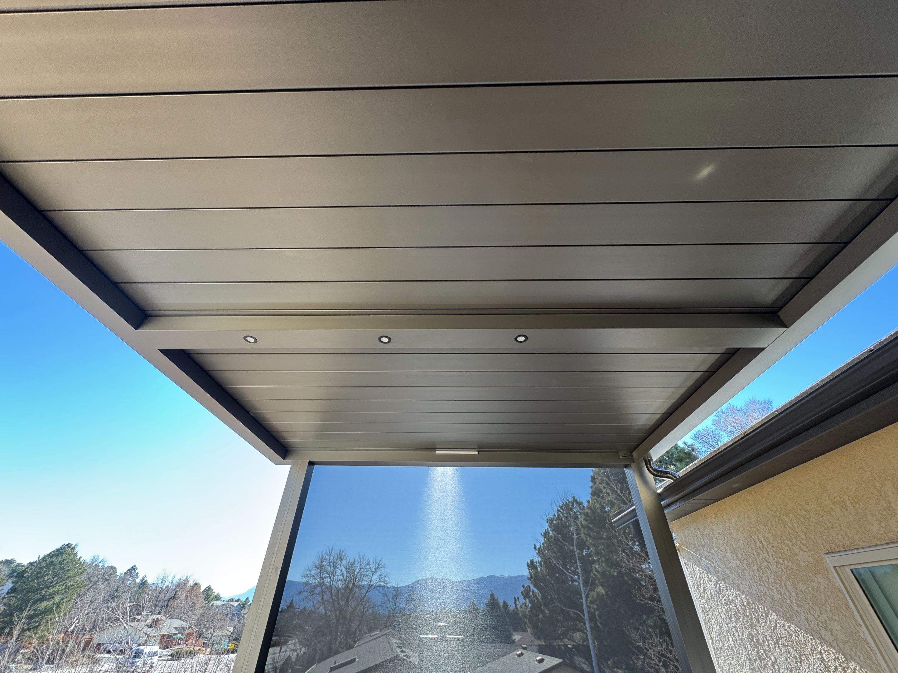 Aluminum Pergola using Azenco Outdoor with MagnaTrack Screen by Outdoor Solutions Colorado