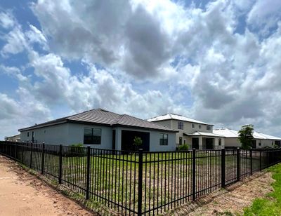 Aluminum Fence Installation using Black 3 Rail Aluminum Fence