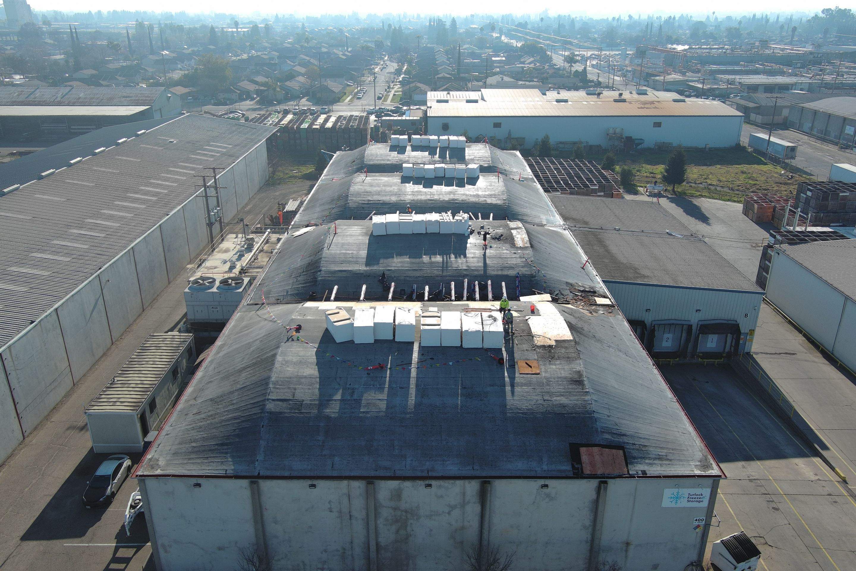 TPO single-ply roofing system using GAF Single-ply TPO 60 mil with 1.5 inch ISO board insulation by Straight Edge Roofing Inc