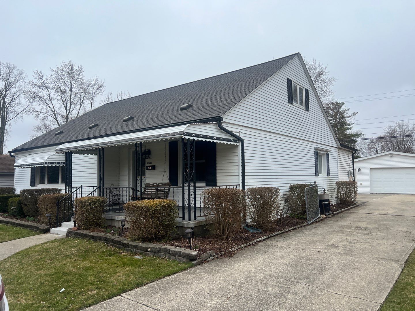 Siding Replacement using CertainTeed Monogram vinyl in Colonial White & Front Porch Remodel by Bloomfield Construction & Restoration