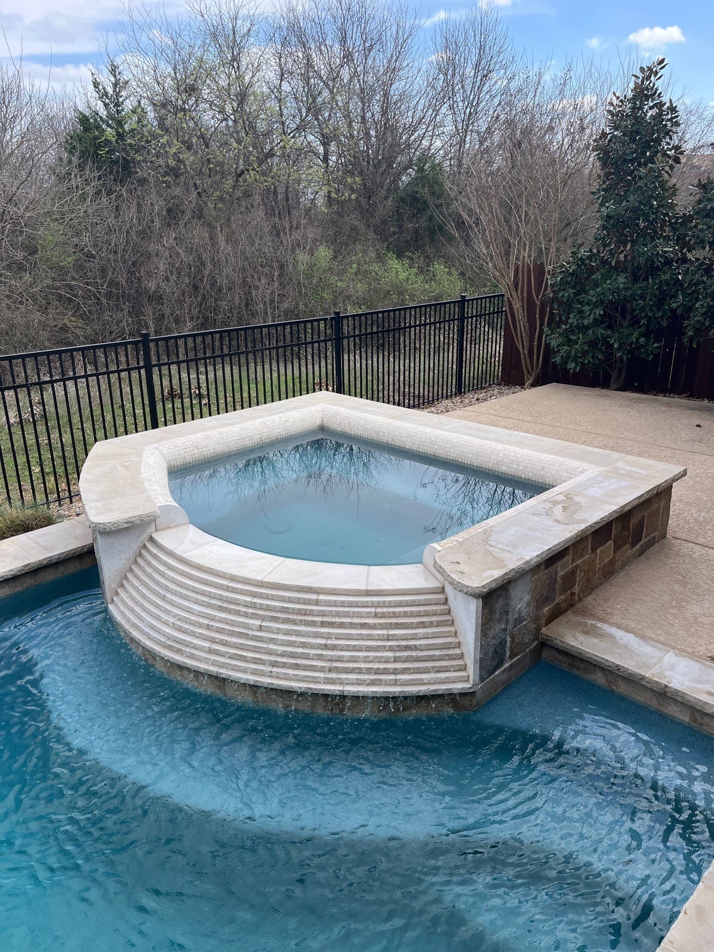 Geometric Pool Remodel with Raised Stone Spa by Pinnacle Pools and Spas - DFW