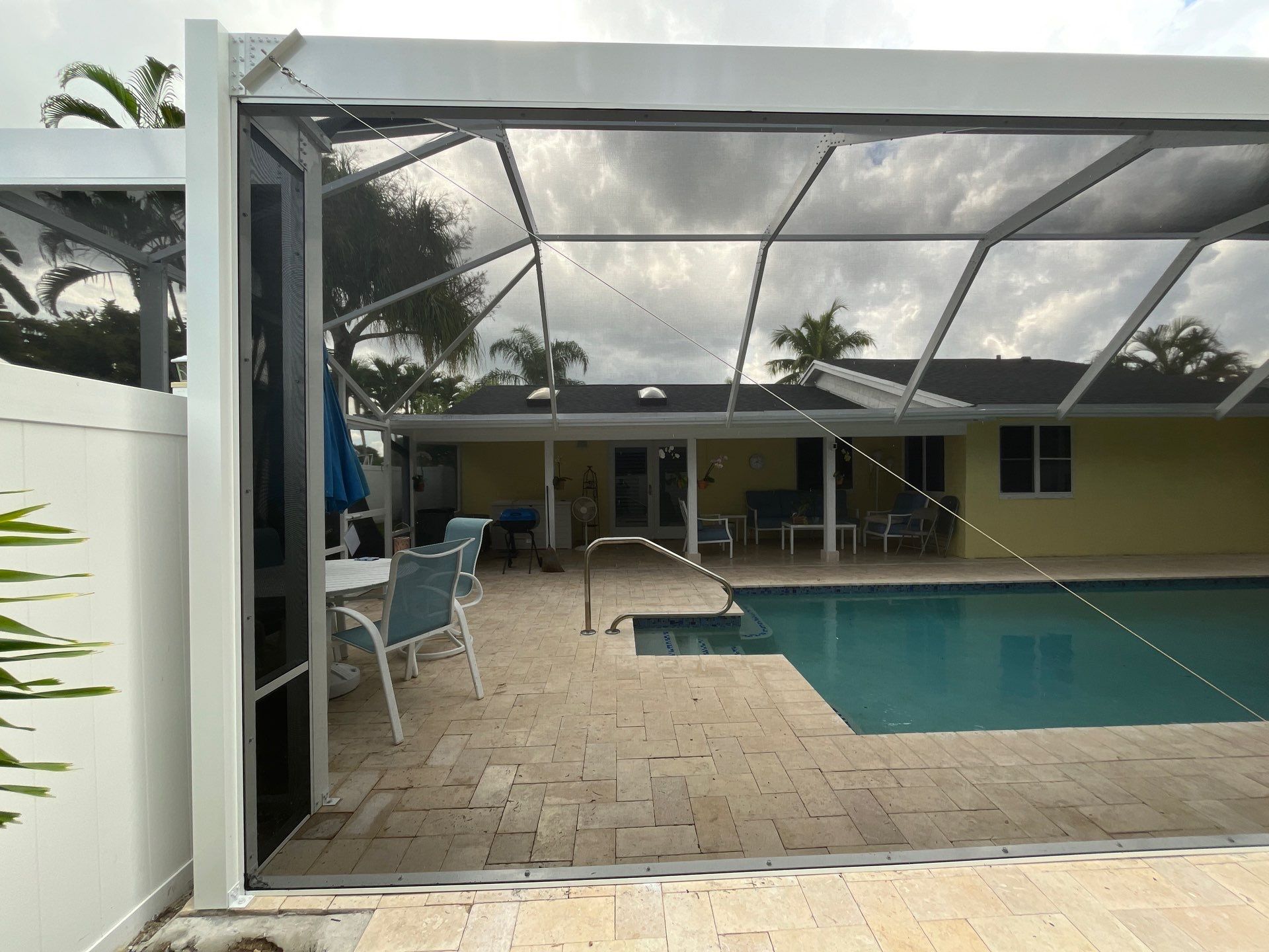 Custom White Pool Enclosure Installation by The Screen Depot, Inc