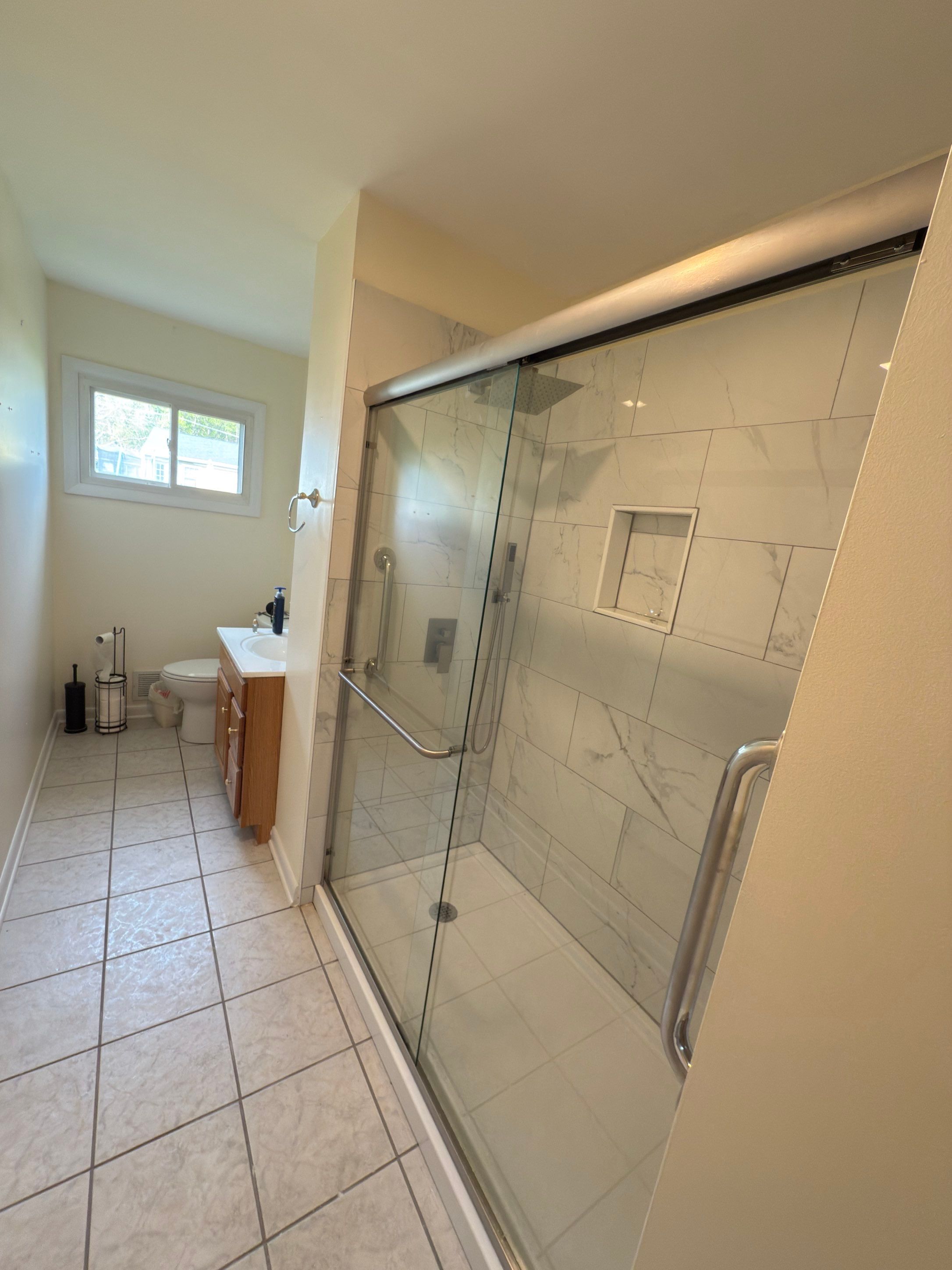 Bathroom Remodel using Tile by Home Concepts Construction