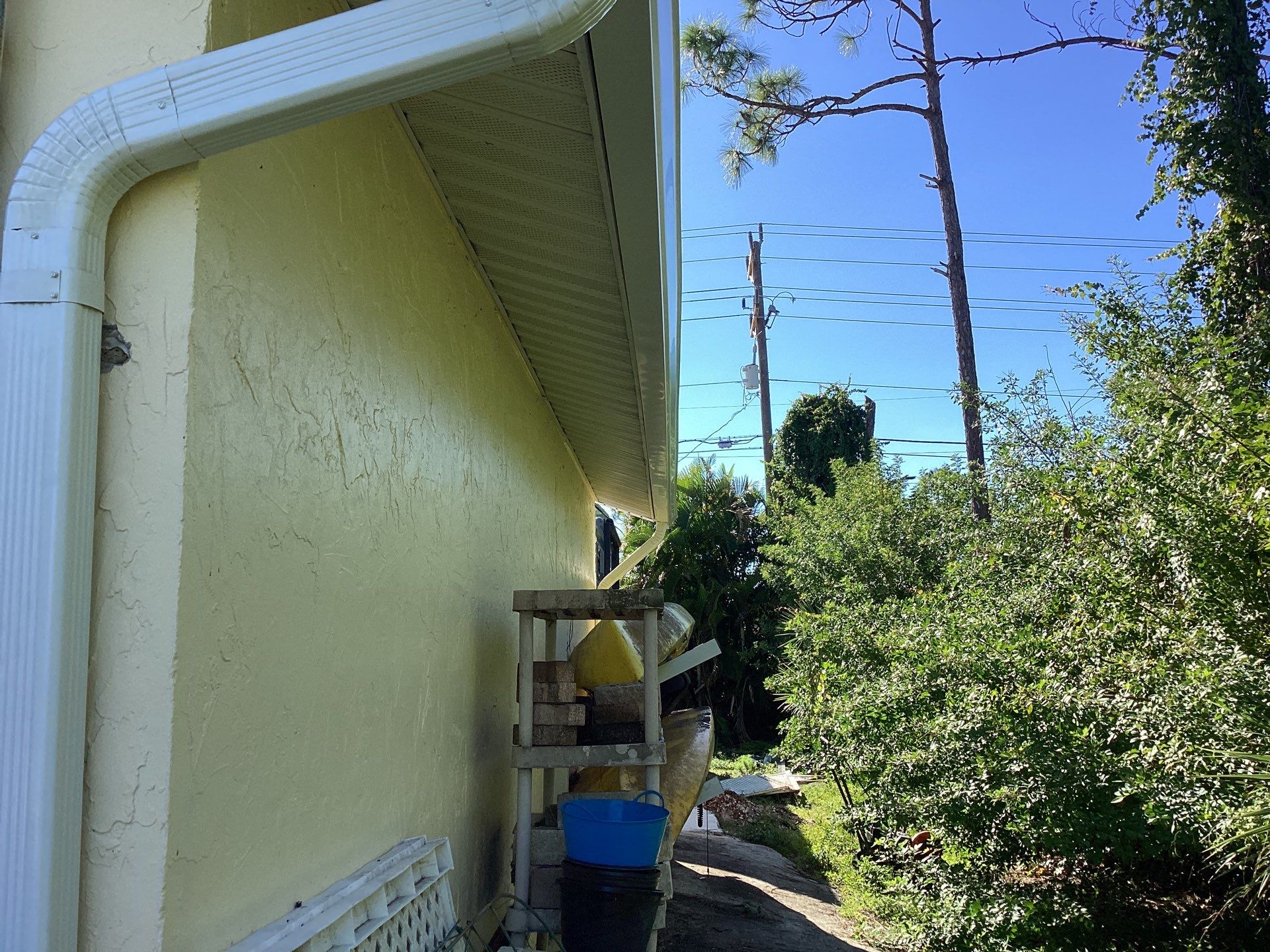 3x4 Downspouts and Seamless Gutters for Coastal Homes in St James City FL by Gutter Professors