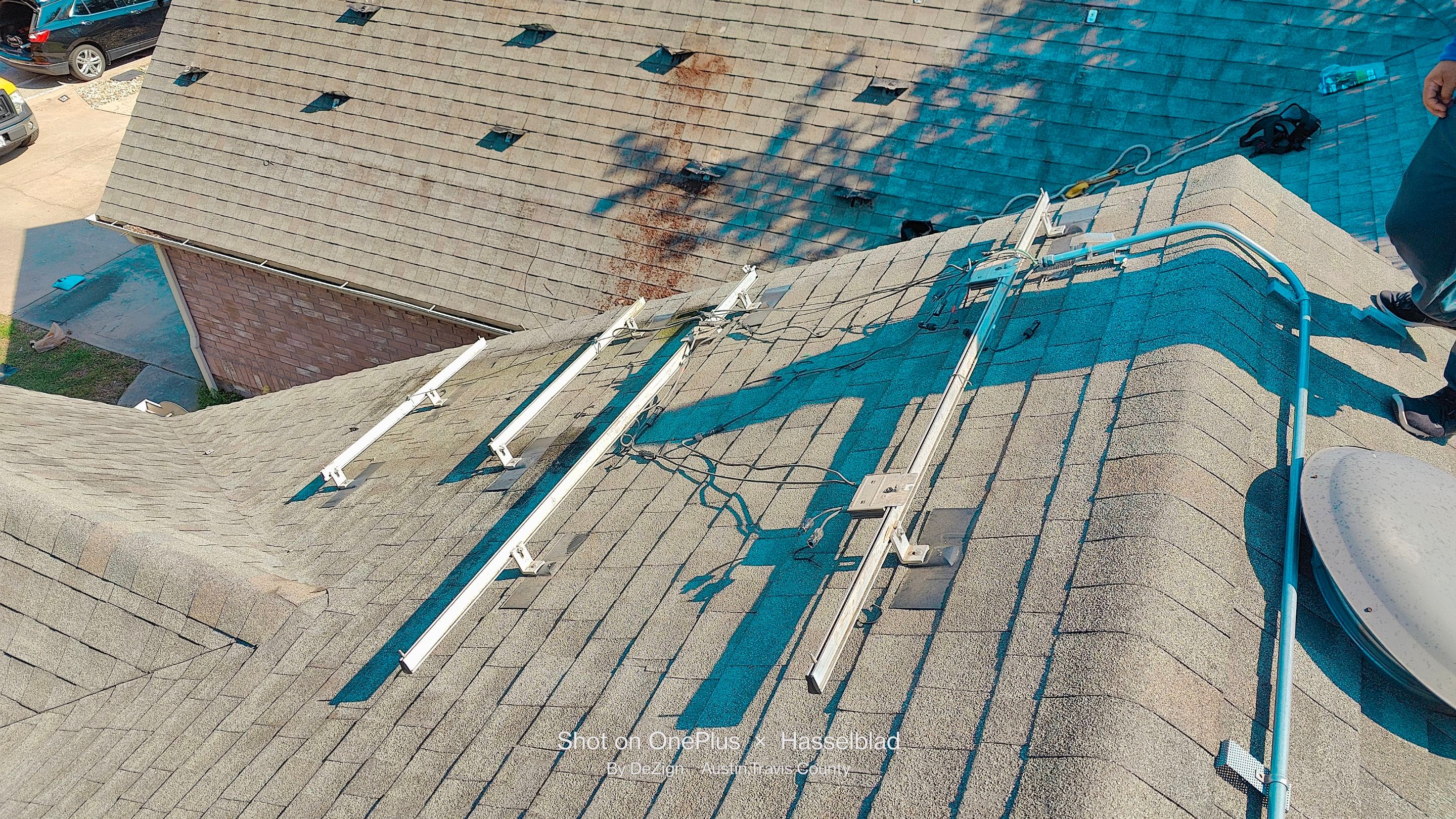Residential Roofing Installation using IKO Dynasty Class 3 IR Granite Black by DeZign Roofing & Exteriors