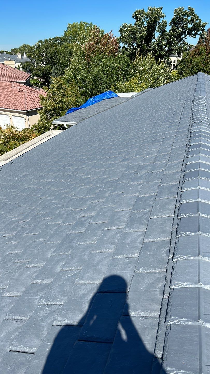 DaVinci Slate Roof Installation and Aluminum Gutter by Custom Installations, Inc.