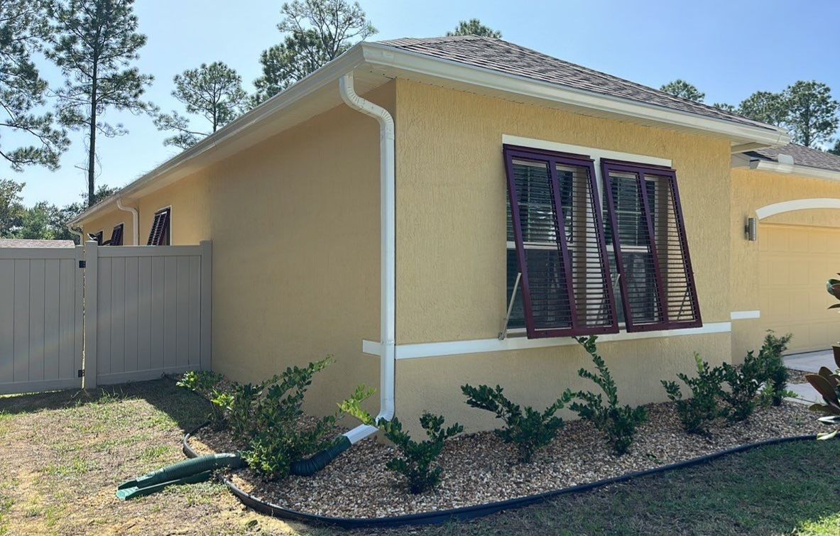Hurricane Rated Bahama Shutters in Wine Red by Smart Guard Shutters