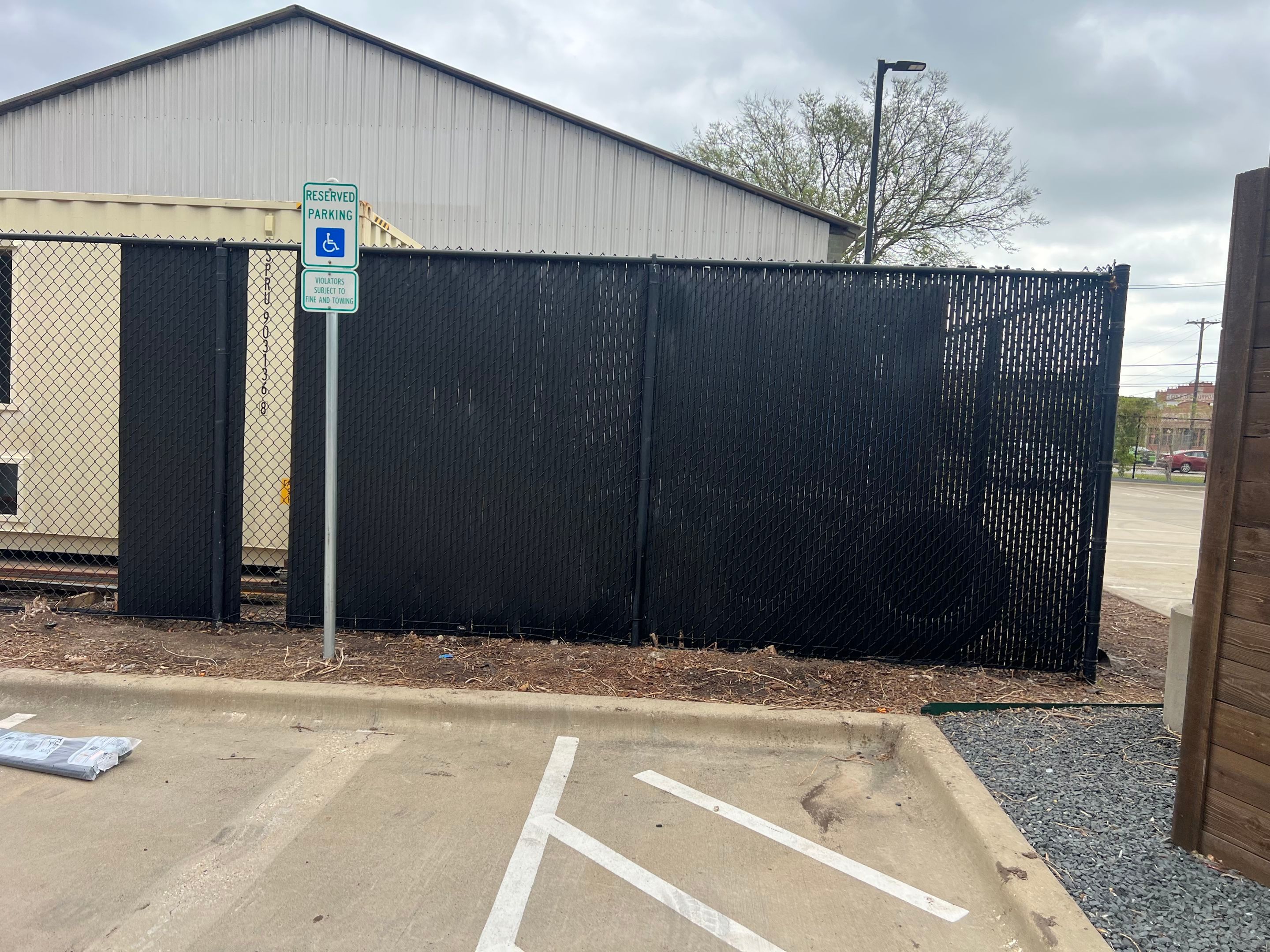 Chain link Privacy Slats by 3:16 Roofing and Construction
