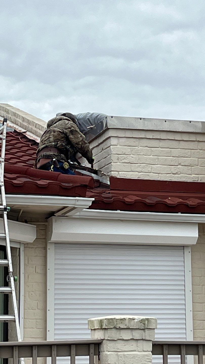 Off with the Tile and on with the TILCOR stone coated metal.  by Bayfront Roofing and Construction