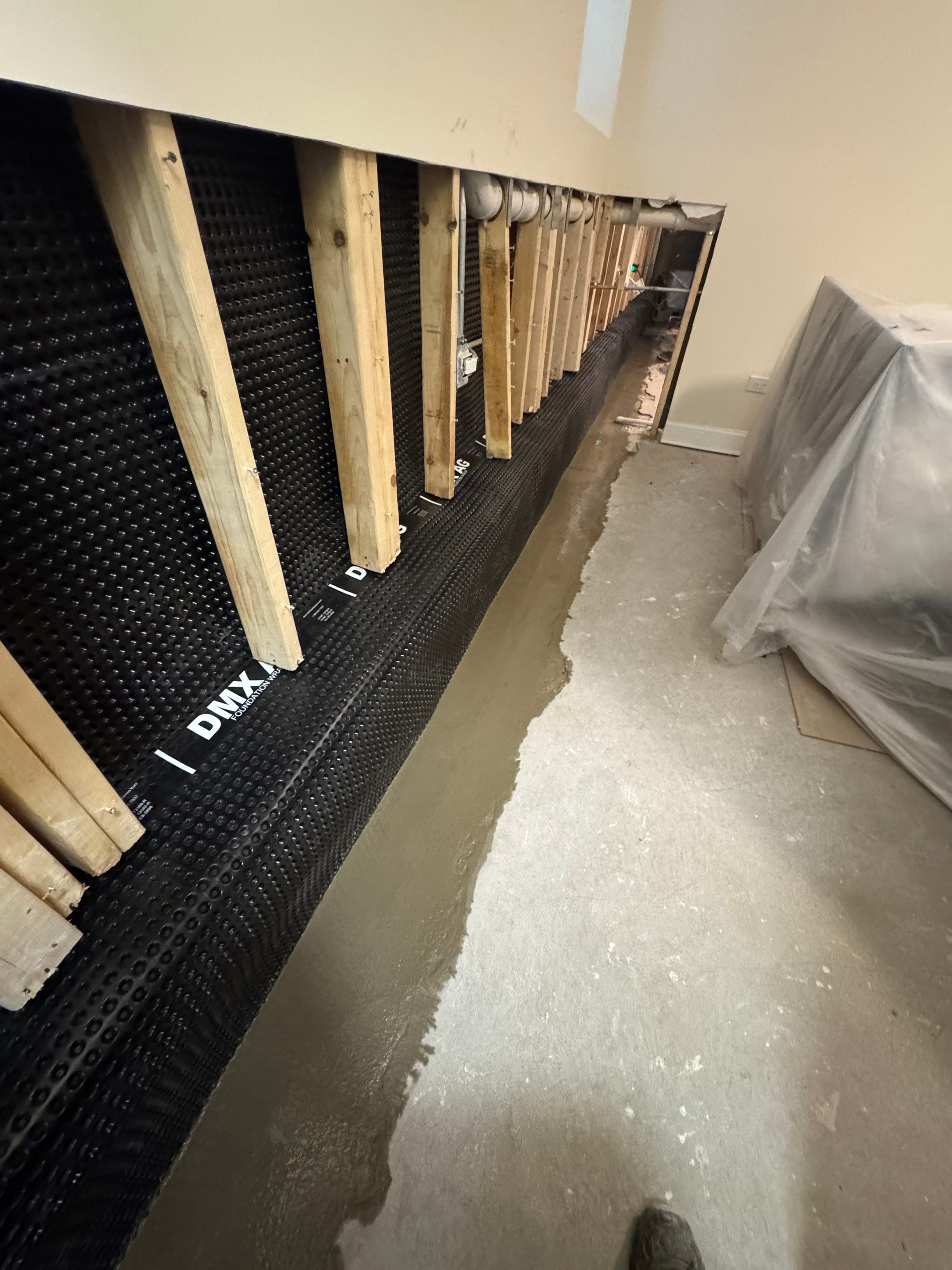 North Side Drain Tile System by Area Wide Waterproofing