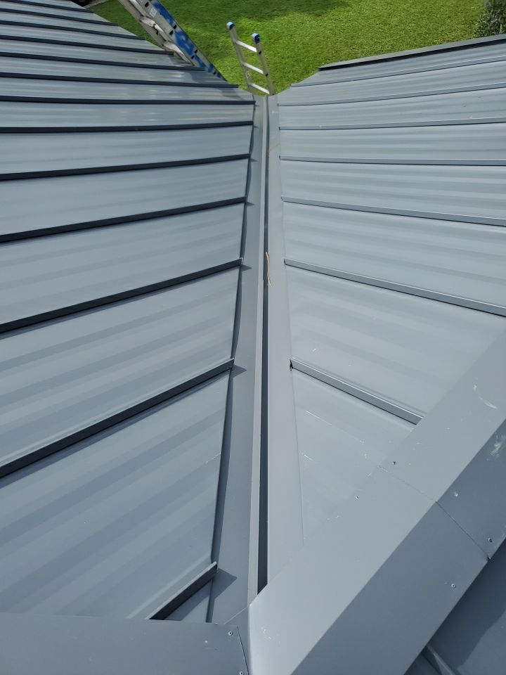 Residential Roofing Installation using 1" Nail strip metal roof by BLUES BROTHERS ROOFING
