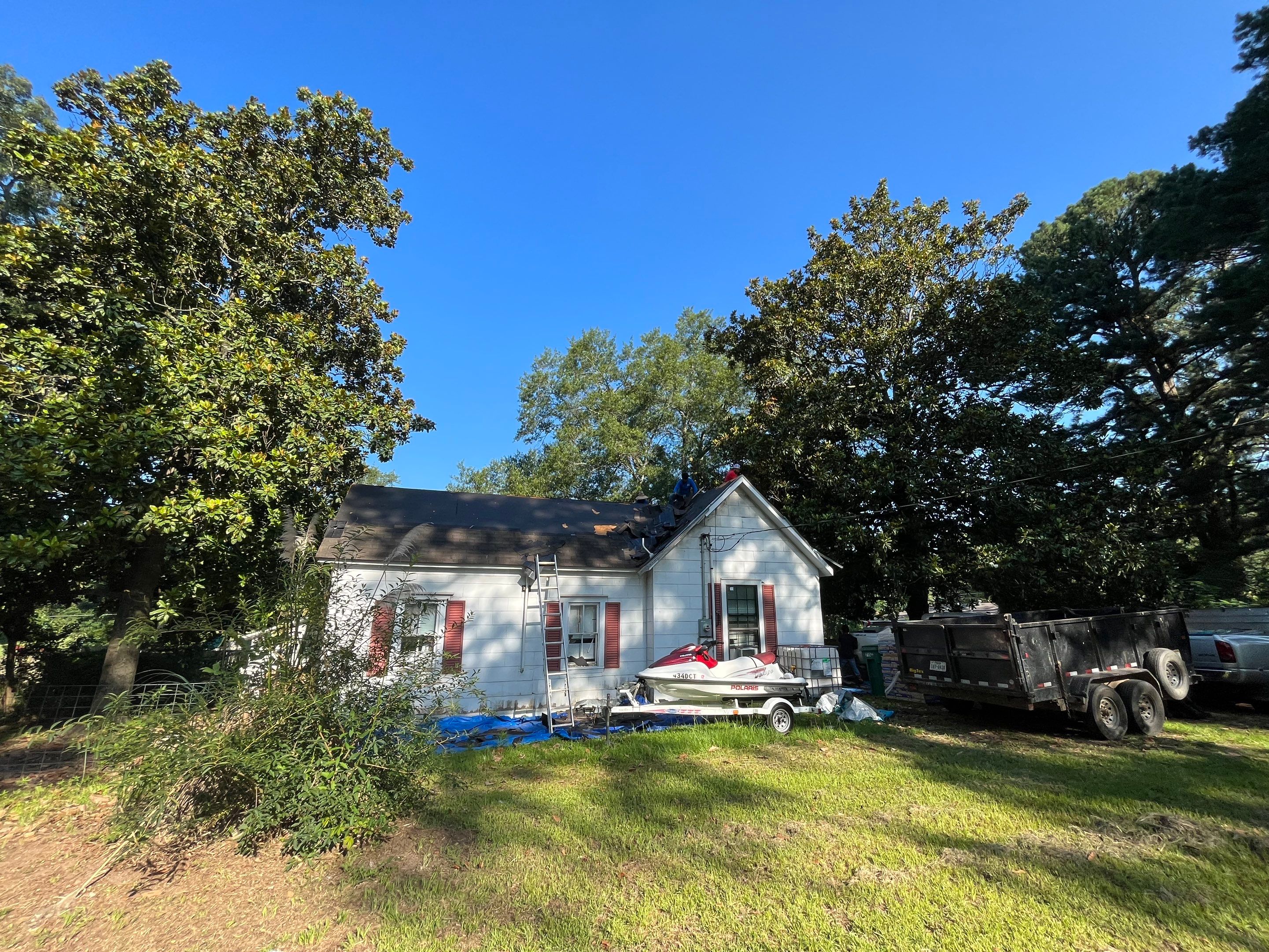 Storm Restoration Reroof: 25 Year 3-Tab Shingle by Hostetler Roofing