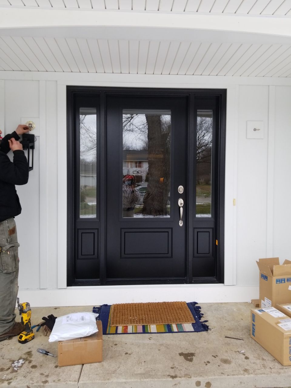 James Hardie Siding  using James Hardie Board and Batten, White by Absolute Roofing and Construction