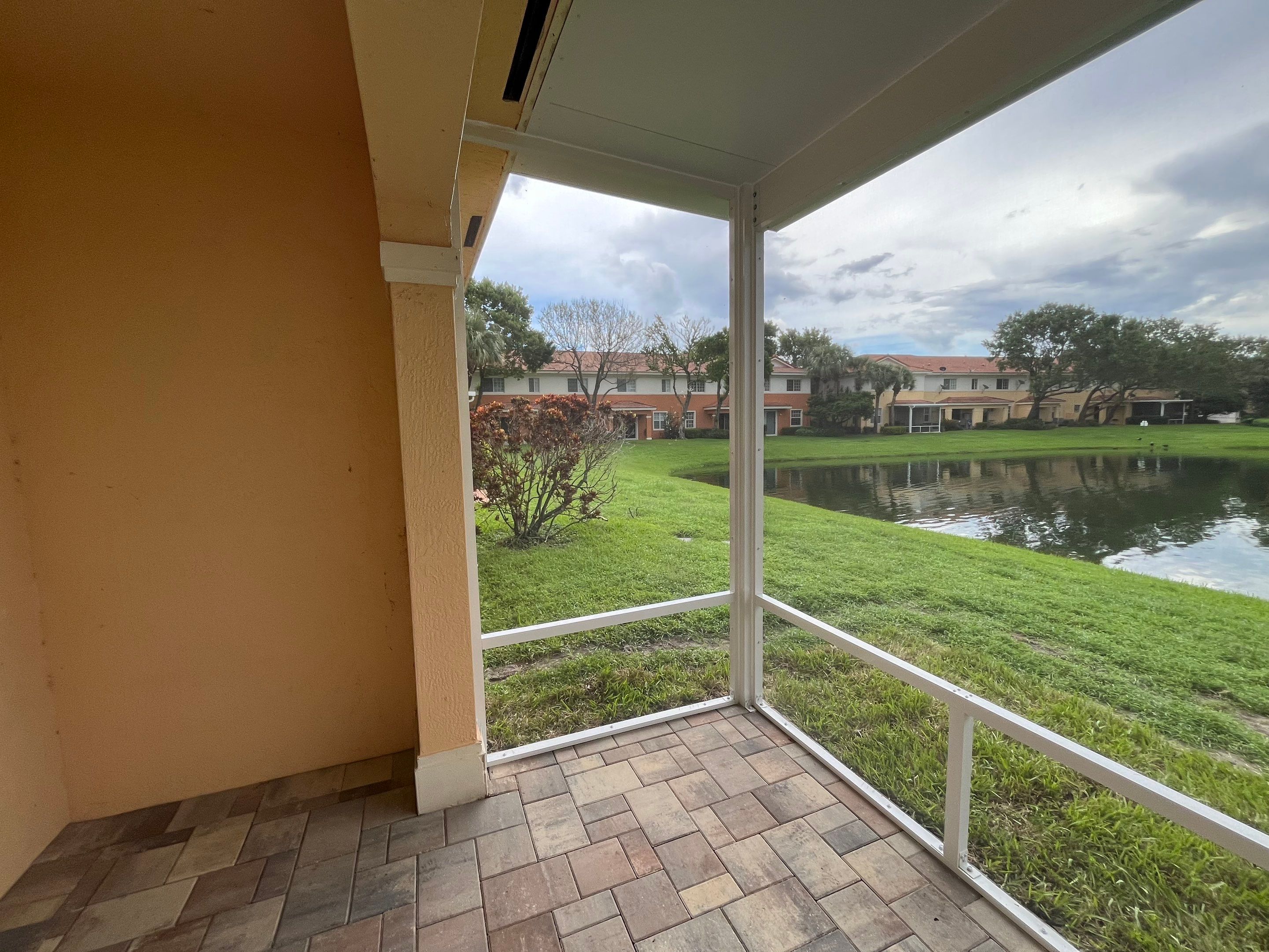 White Aluminum Screen Enclosure and Aluminum Roof Installation in Boynton Beach by The Screen Depot, Inc