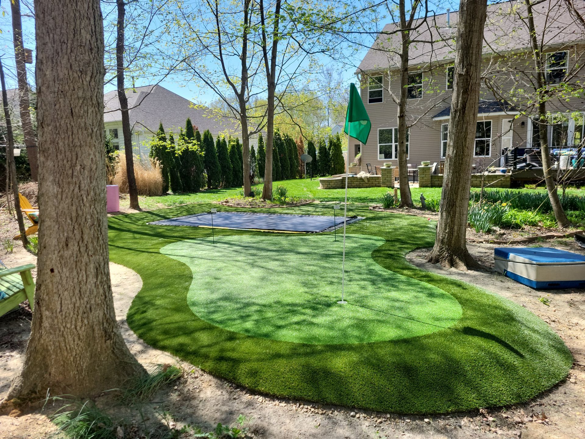 Green and Lawn around trampoline Galena, OH by Southwest Greens Midwest