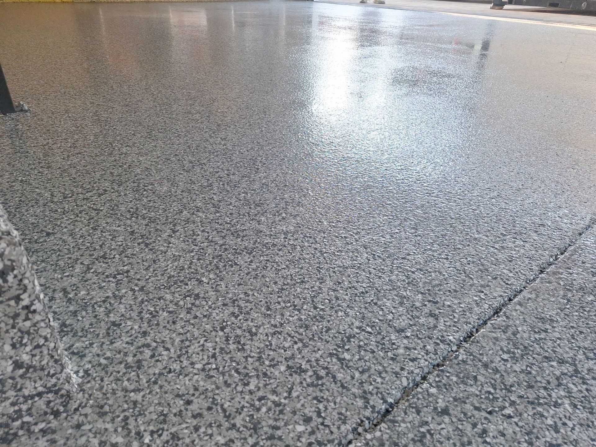Garage Transformation using Slate Stone by Croc Coatings, LLC