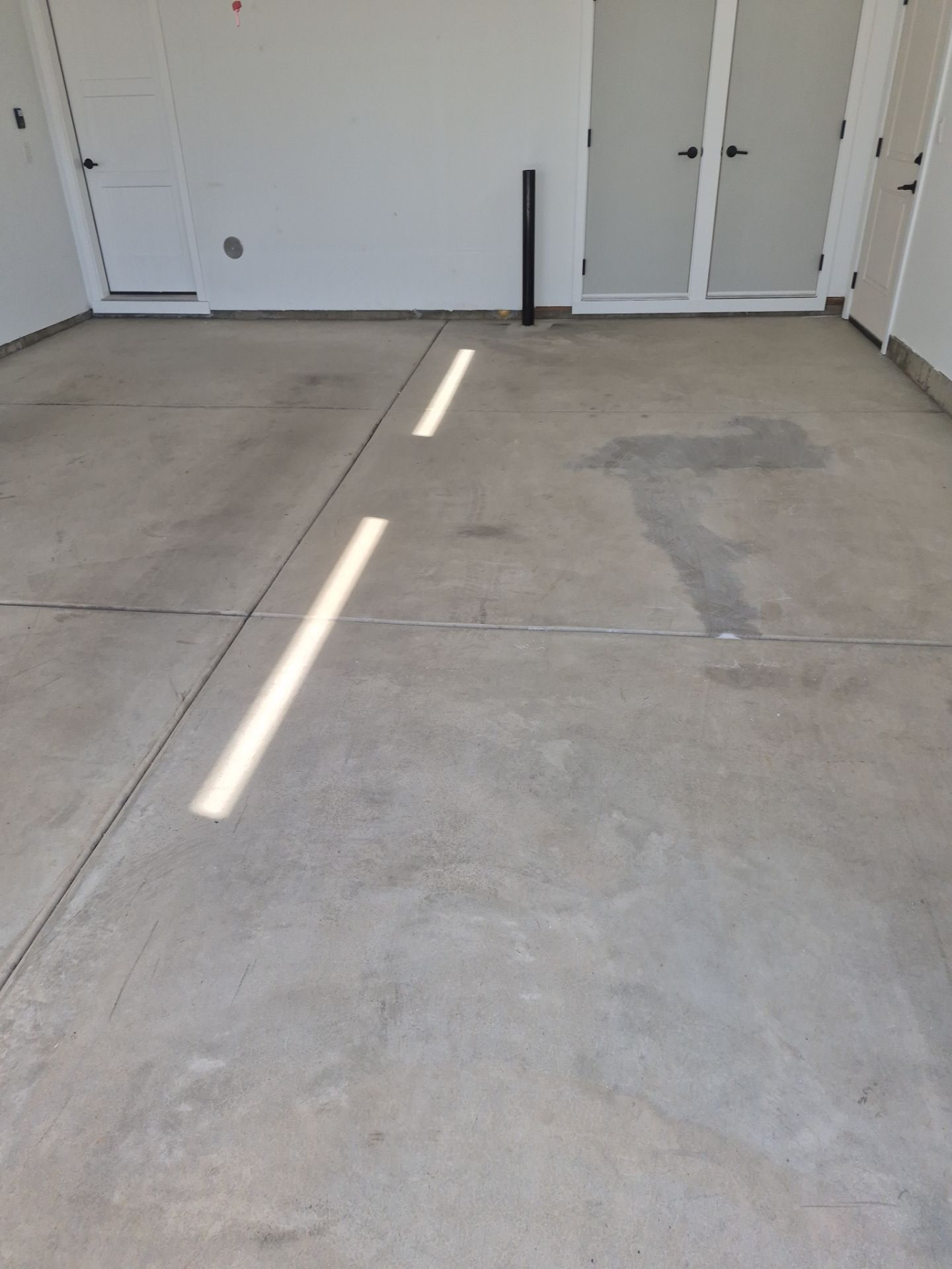 Limestone Hybrid Garage Floor Transformation in Coeur d'Alene by Croc Coatings, LLC