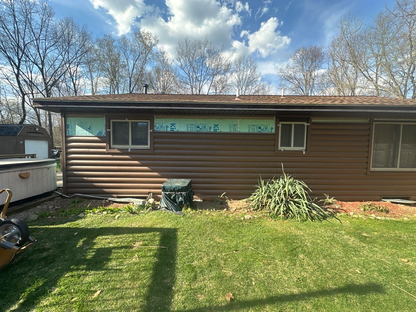 Siding Installation using Timbermill Forest Brown by 180 Contractors