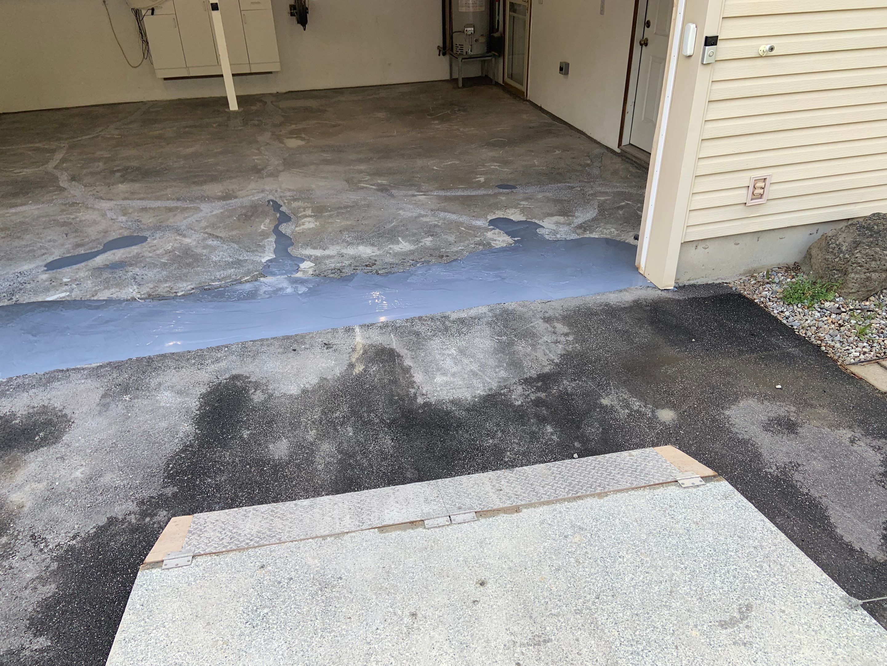 Garage Transformation using Domino for Garage and Pecan for Pool Deck by Croc Coatings, LLC