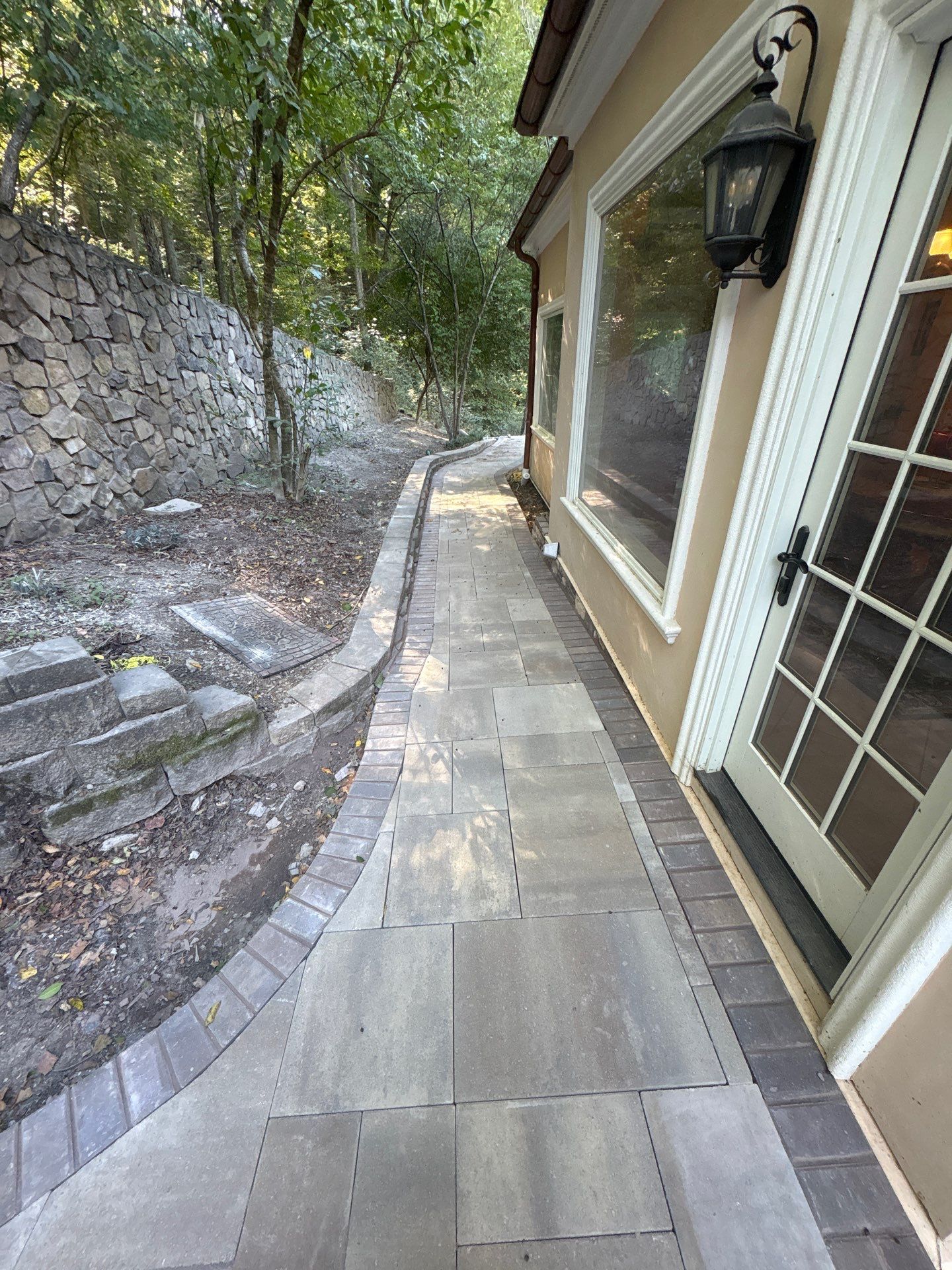 Franklin Exterior Remodel Featuring Custom Stucco and Stone Hardscaping by U.S. Exterior Solutions