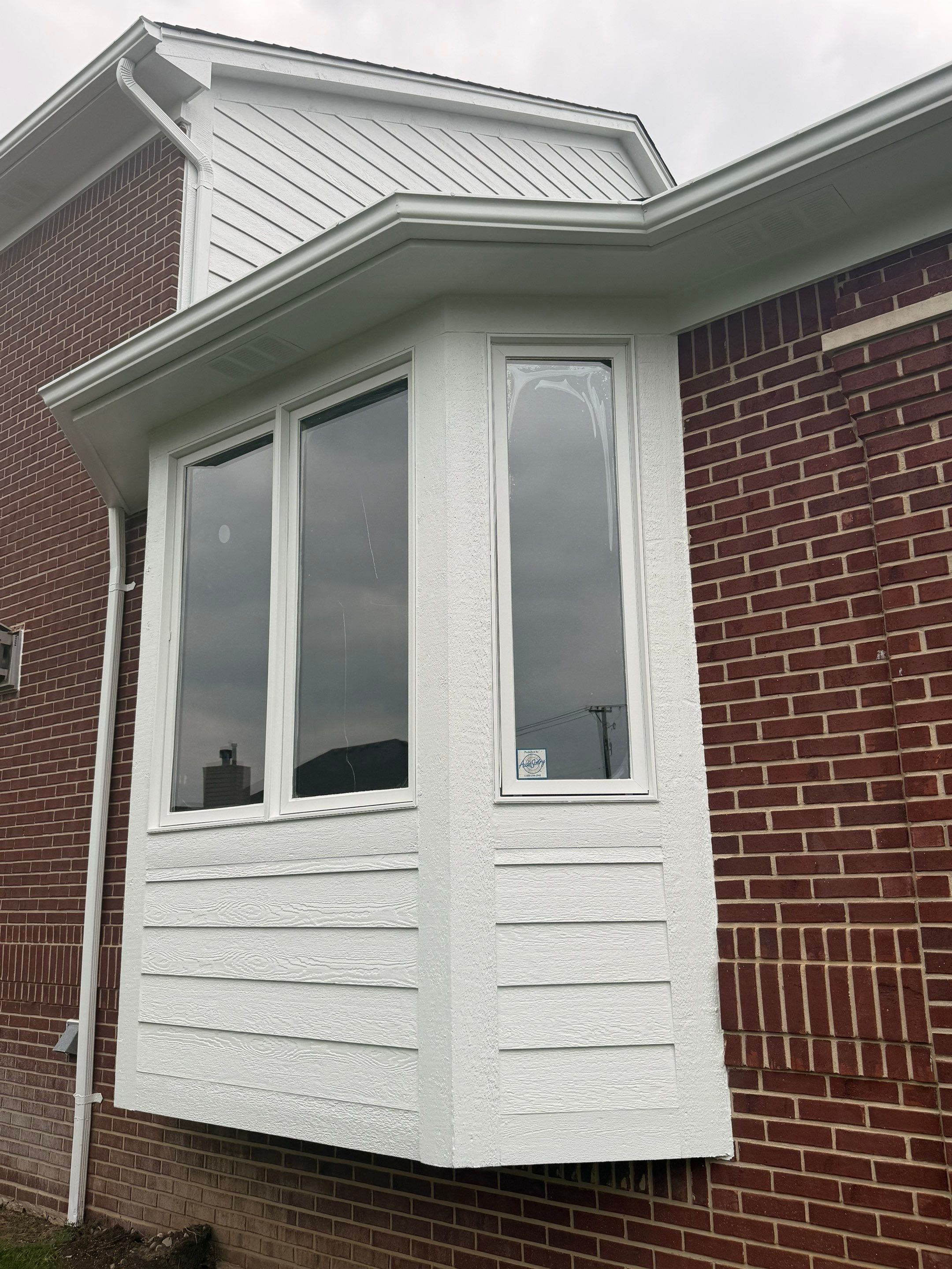 Exterior Wood Rot Repair and Trim Restoration in White Lake by Top Shelf Painter