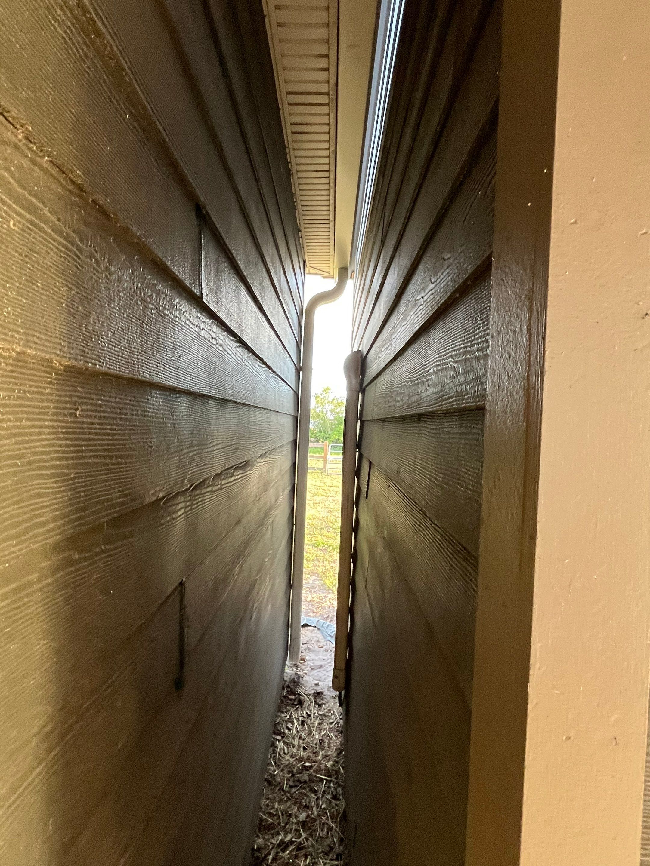  7-inch White seamless gutters and downspouts in Myakka City FL by Gutter Professors