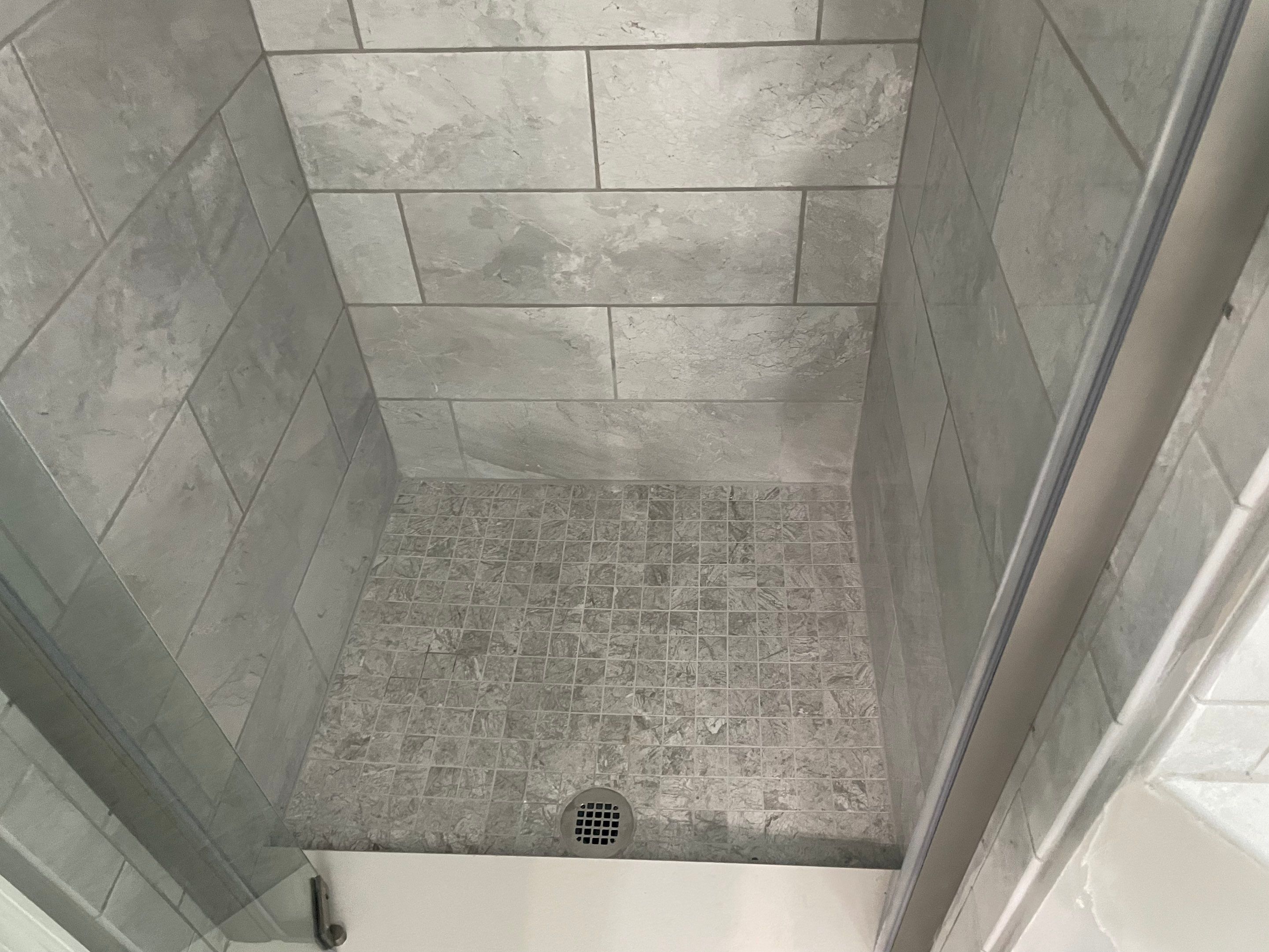 Bathroom Remodel using Tile by Home Concepts Construction