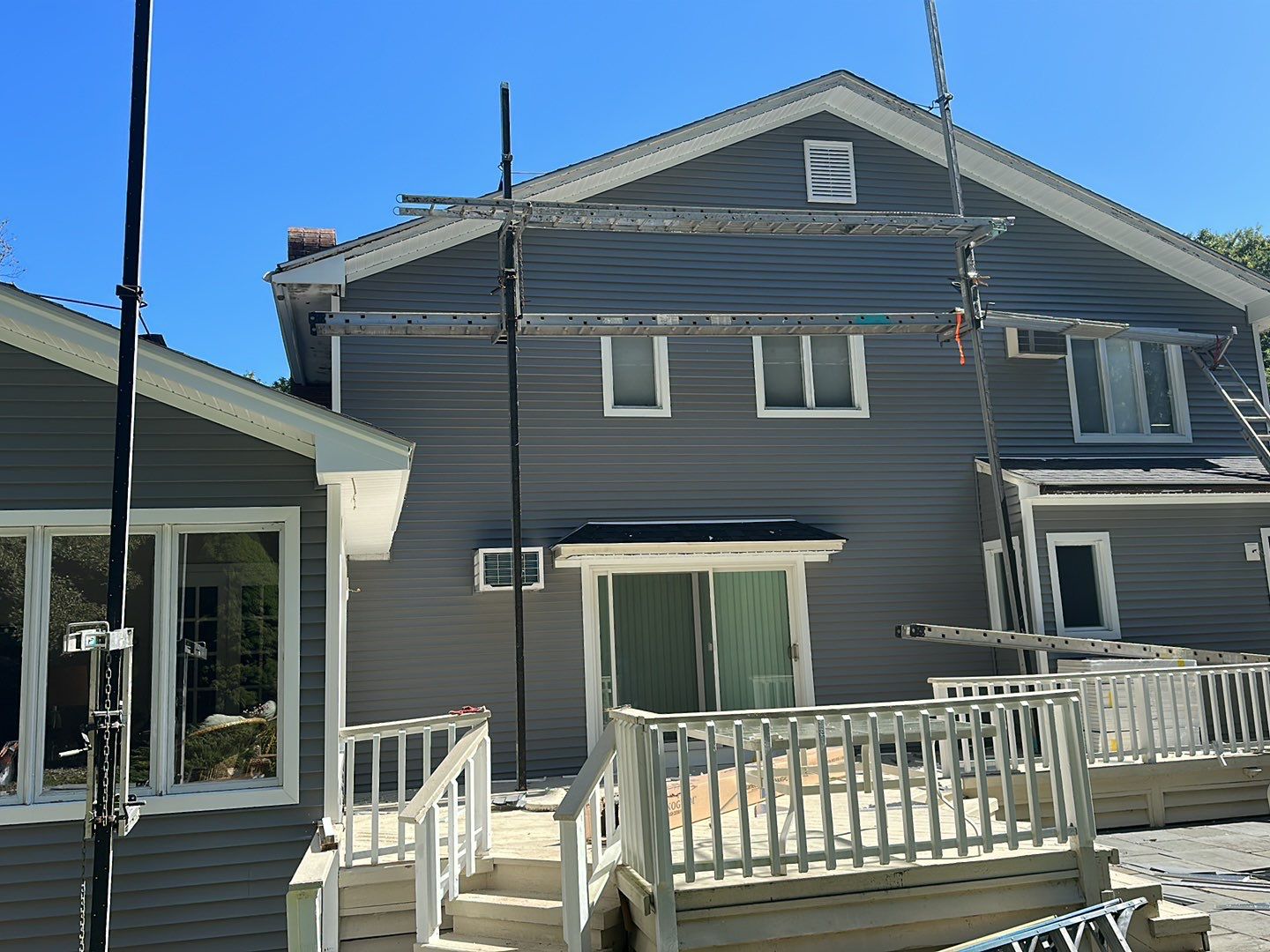 Residential Roofing Installation using Owens Corning TruDefinition Duration AR - Onyx Black & New Siding Using Mainstreet Charcoal Gray by A Plus Exterior