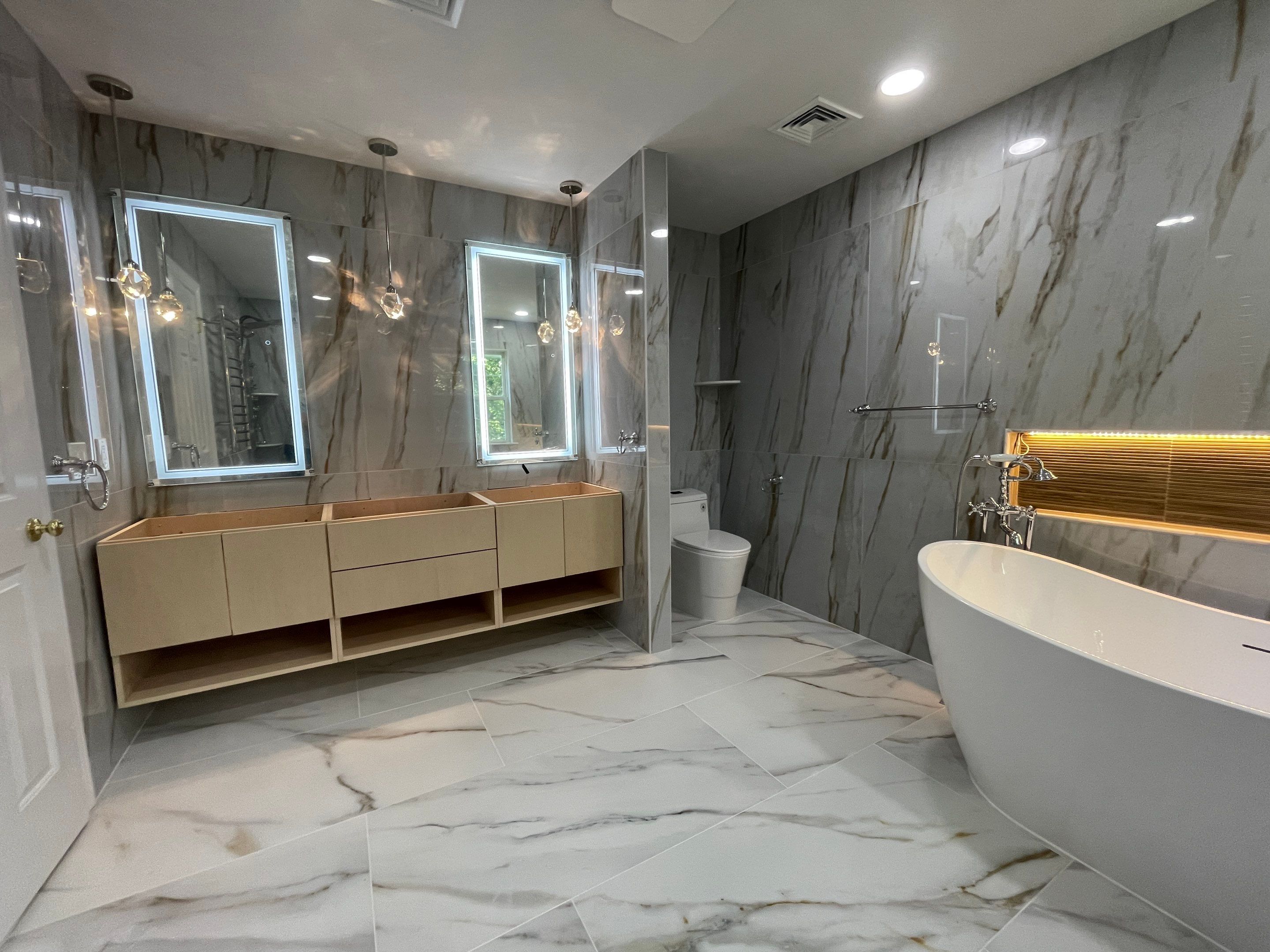 Bathroom Remodel using Tile by Home Concepts Construction