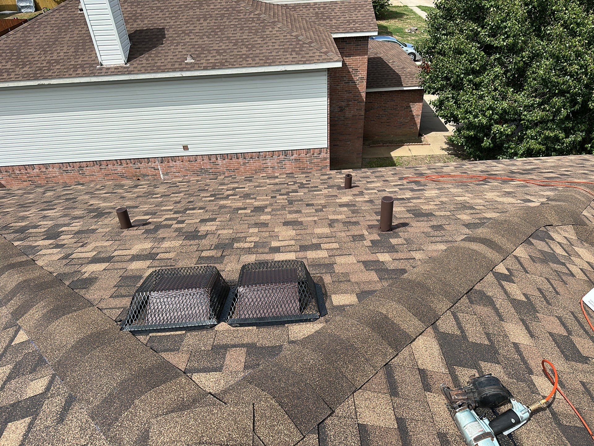 Full Roof Replacement, Chimney Rebuild and Interior Damage Replacement by First United Roofing & Construction